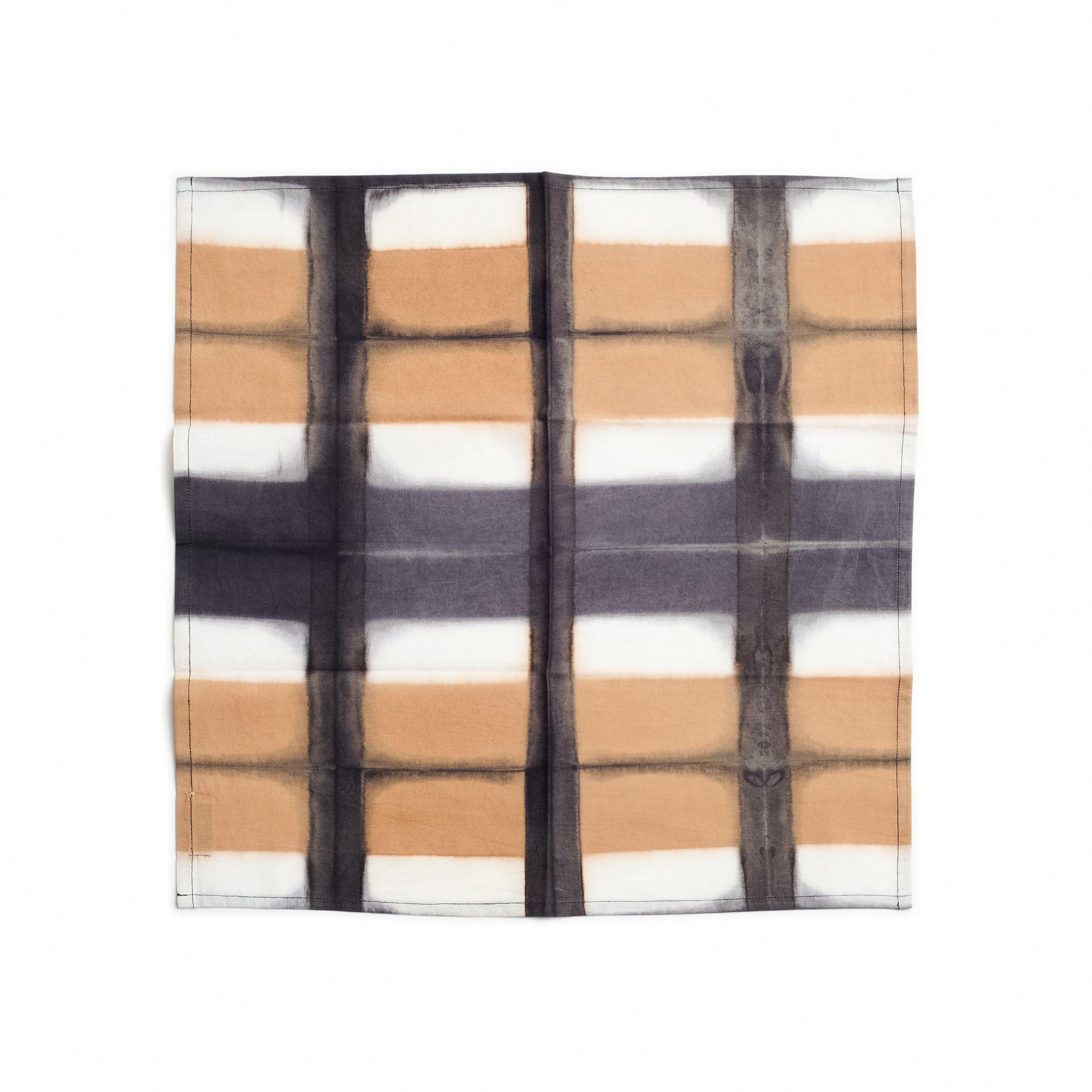 Chowk  table napkin is a unique artisanal napkin. Created artistically and ethically by artisans in India using clamp dye technique, using only pure natural dyes. It is a pure statement piece that adds modern and timeless quality as a table ware