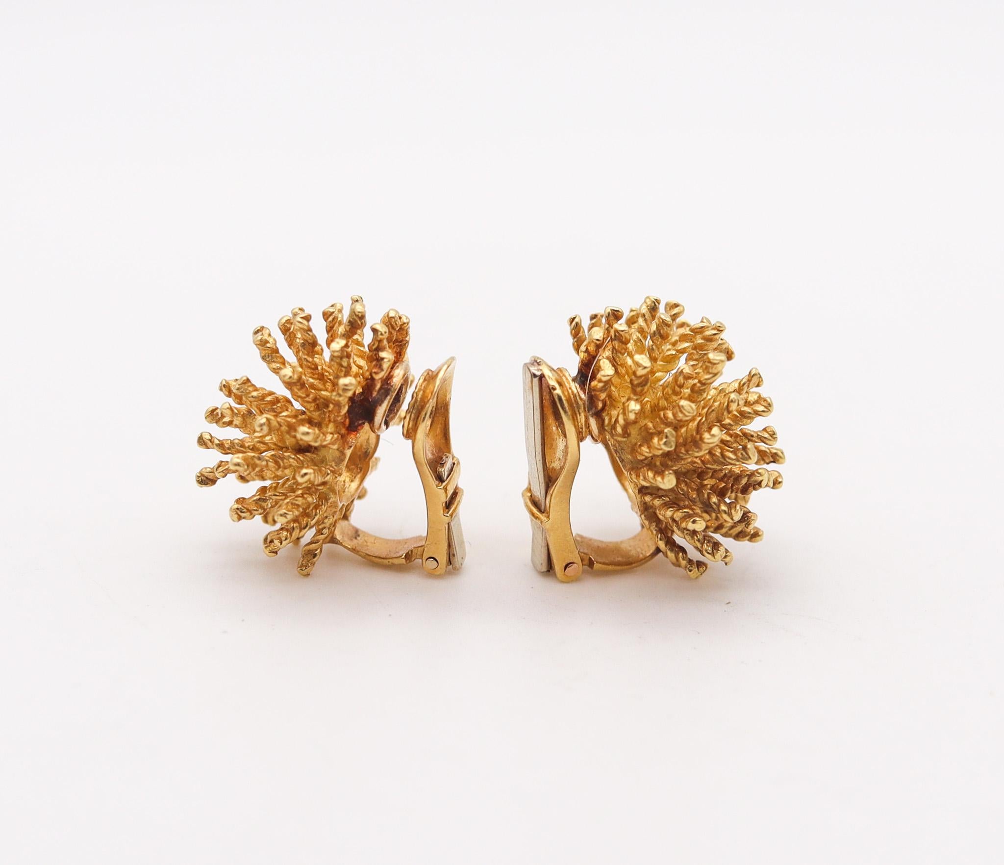 Clips-on earrings designed by Tishman & Lipp.

Very unusual pair of clips-on earrings created in New York city, by the jewelry company of Tishman & Lipp, back in the 1960. These pair has been crafted with multiples spikes as a sputnik made up from