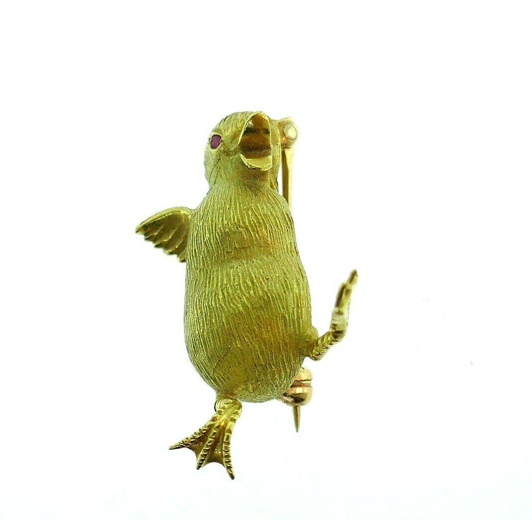 Cute vintage Baby Duck pin by Tishman & Lipp, made of 18k yellow gold features ruby. Stamped with a hallmark for 18k gold and Tishman & Lipp maker's mark.
Measurements: 1
