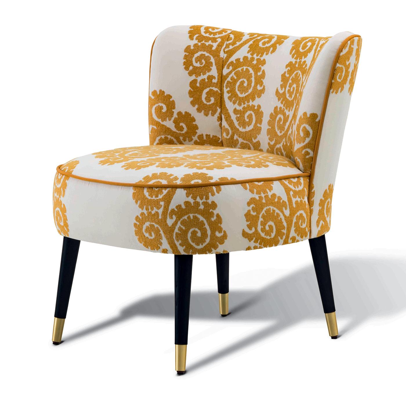 This classy yet original upholstered chair features legs in natural oak, ebonized oak or sucupira with brass or black painted metal tips. The seat and the backrest are made of wood and are upholstered with high-strength, variable-density foam with