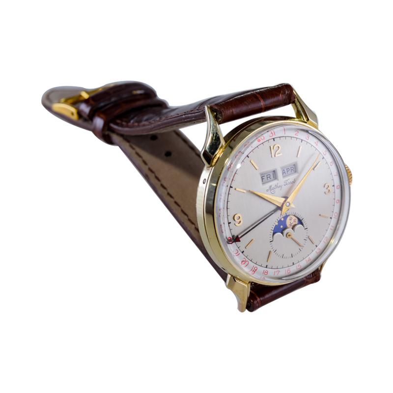 Tissot 14kt. Armbanduhr aus massivem Gold mit drei Datumsanzeigen, ca. 1940er Jahre 5