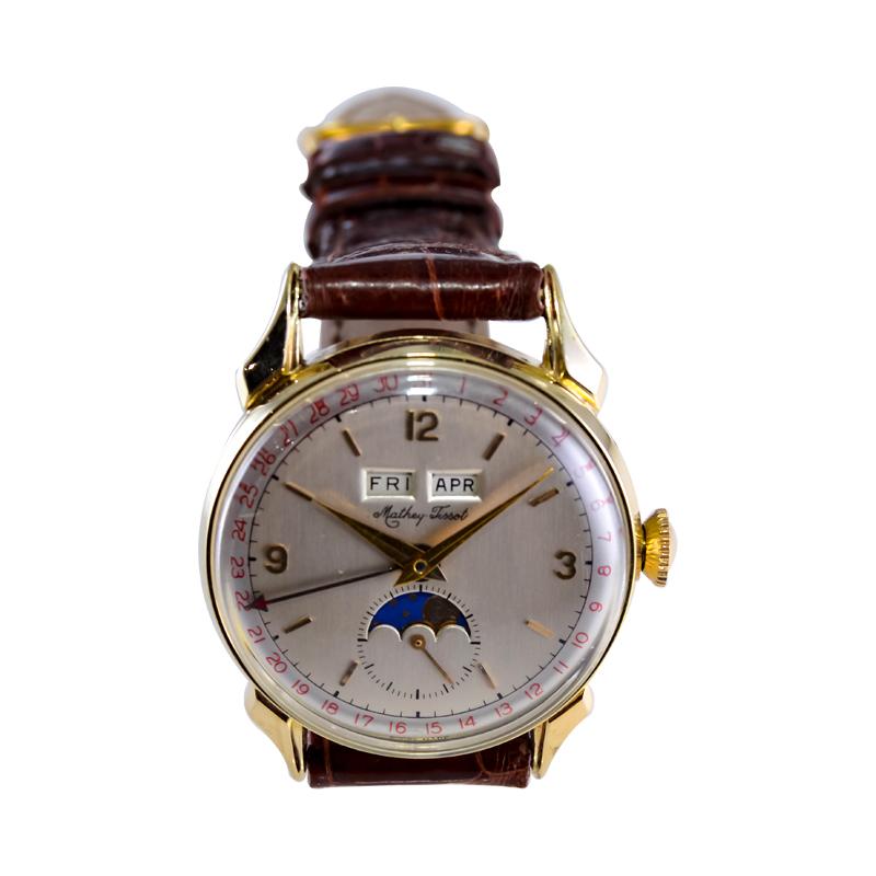 Tissot 14kt. Armbanduhr aus massivem Gold mit drei Datumsanzeigen, ca. 1940er Jahre 6