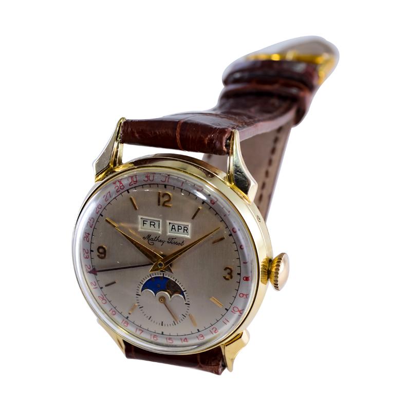 Tissot 14kt. Armbanduhr aus massivem Gold mit drei Datumsanzeigen, ca. 1940er Jahre 8