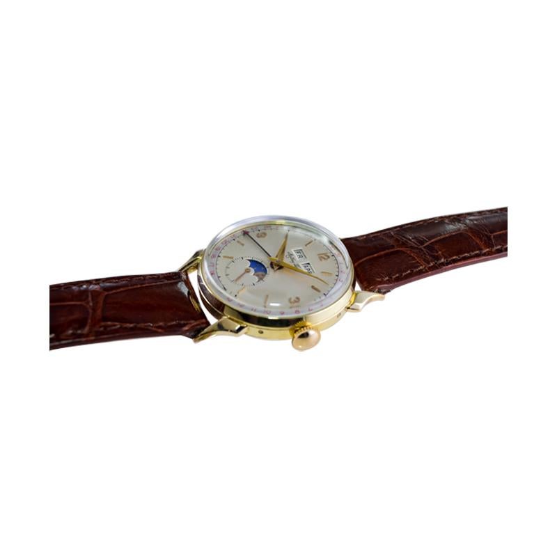 Tissot 14kt. Armbanduhr aus massivem Gold mit drei Datumsanzeigen, ca. 1940er Jahre 10