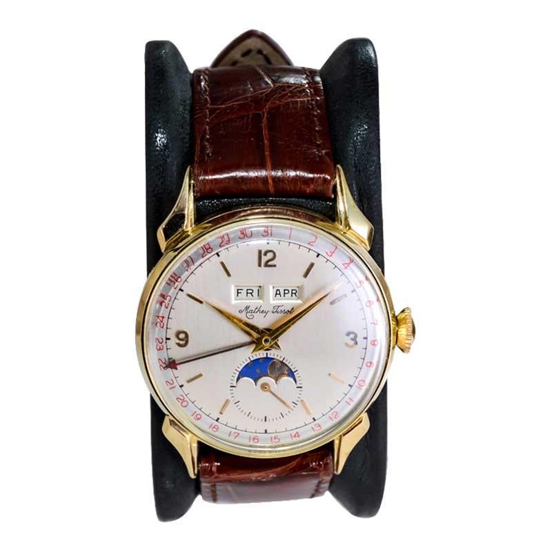 Tissot 14kt. Armbanduhr aus massivem Gold mit drei Datumsanzeigen, ca. 1940er Jahre 2