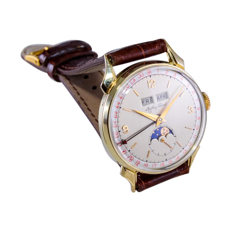 Tissot 14kt. Armbanduhr aus massivem Gold mit drei Datumsanzeigen, ca. 1940er Jahre 4