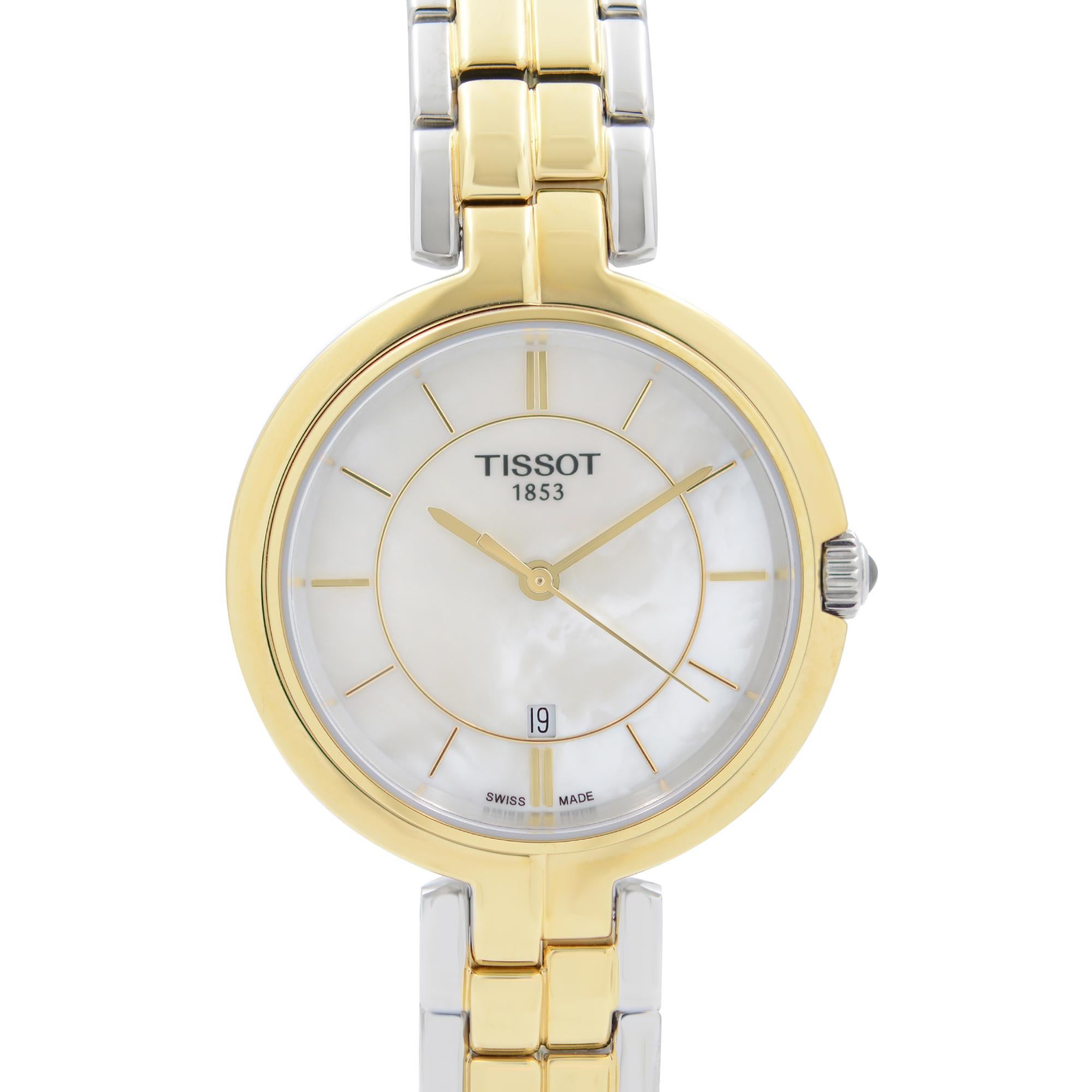 Display Model Tissot Flamingo Quartz Ladies Watch T094.210.22.111.01. The Watch Has Minor Blemishes on Gold Tone Parts Due to Store Handling. This Beautiful Timepiece is Powered by Quartz (Battery) Movement and Features: Rounds Stainless Steel Case