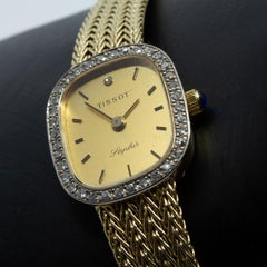 Tissot Ladies circa 1980s Diamond and 14 Karat Gold Wristwatch Signed "Saphir"