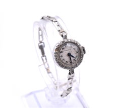 Tissot Ladies Vintage Platinum 14 Karat Gold Bracelet Watch with Diamond Bezel