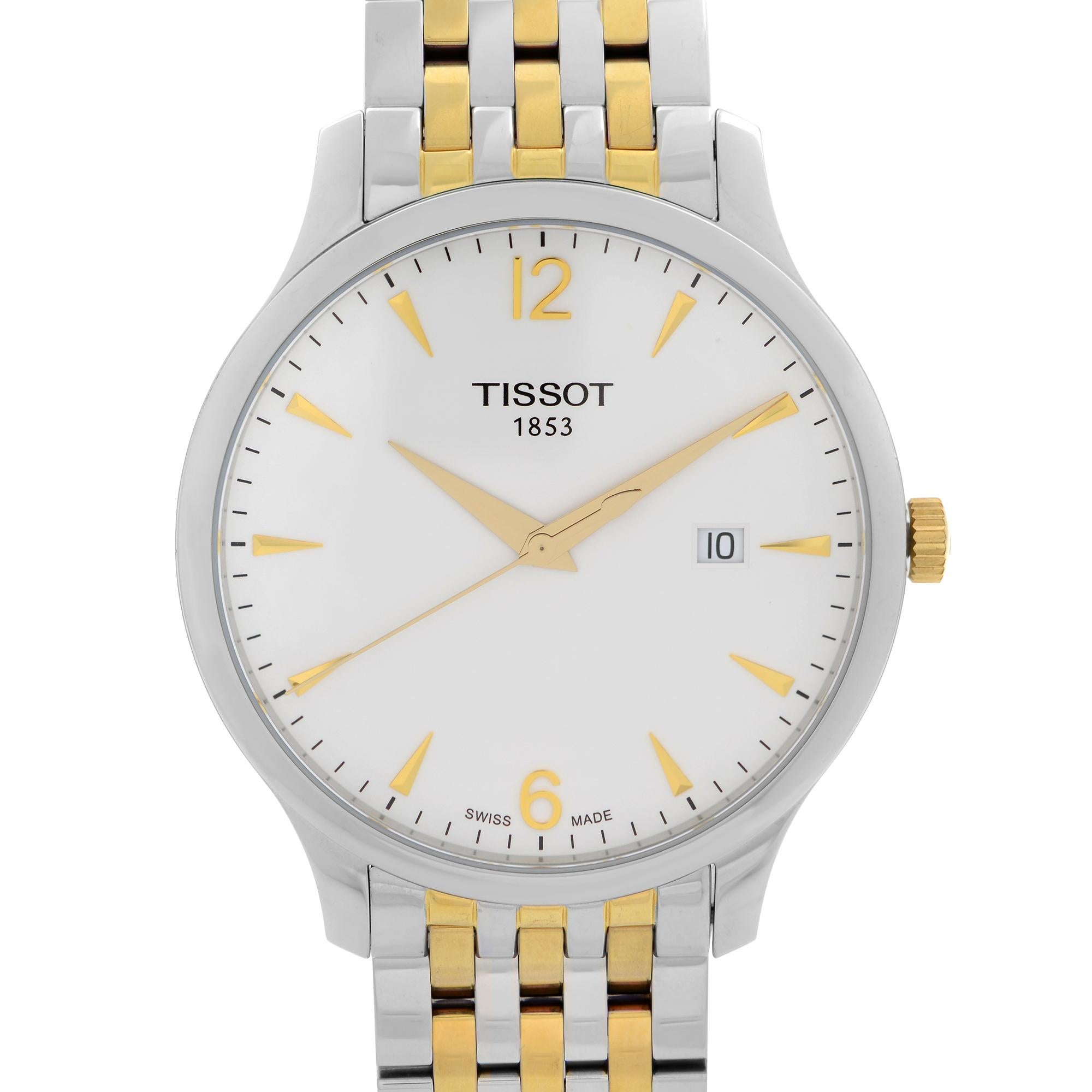Display Tissot T-Classic Tradition Stainless Steel White Dial Men's Quartz Watch T063.610.22.037.00. This Beautiful Timepiece Features: Stainless Steel Case with a Two-Tone Stainless Steel Bracelet. Fixed Steel Bezel. White Dial with Gold-Tone Hands