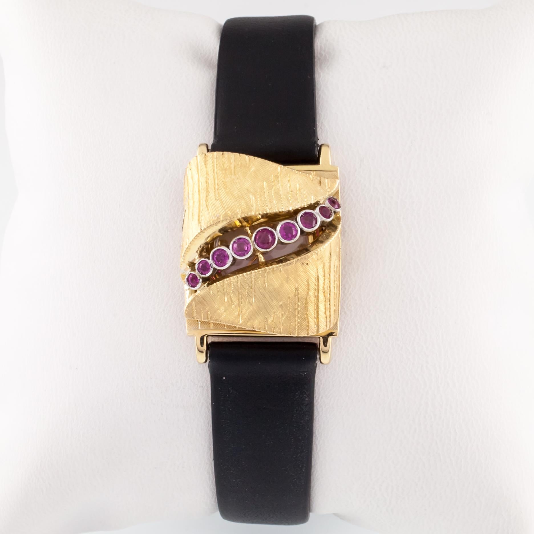 Tissot Vintage 18k Yellow Gold Ladies Dress Watch w/ Ornate Tourmaline Cover

Movement #129E5011905

18k Yellow Gold Case

Features 18k Yellow Gold Miniature Watch Case Set in Gold Frame w/ Hinge and Accented by Gold & Tourmaline Cover

Cover