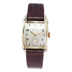 Tissot Yellow Gold Filled Art Deco Tonneau Shaped Watch, Circa 1940's