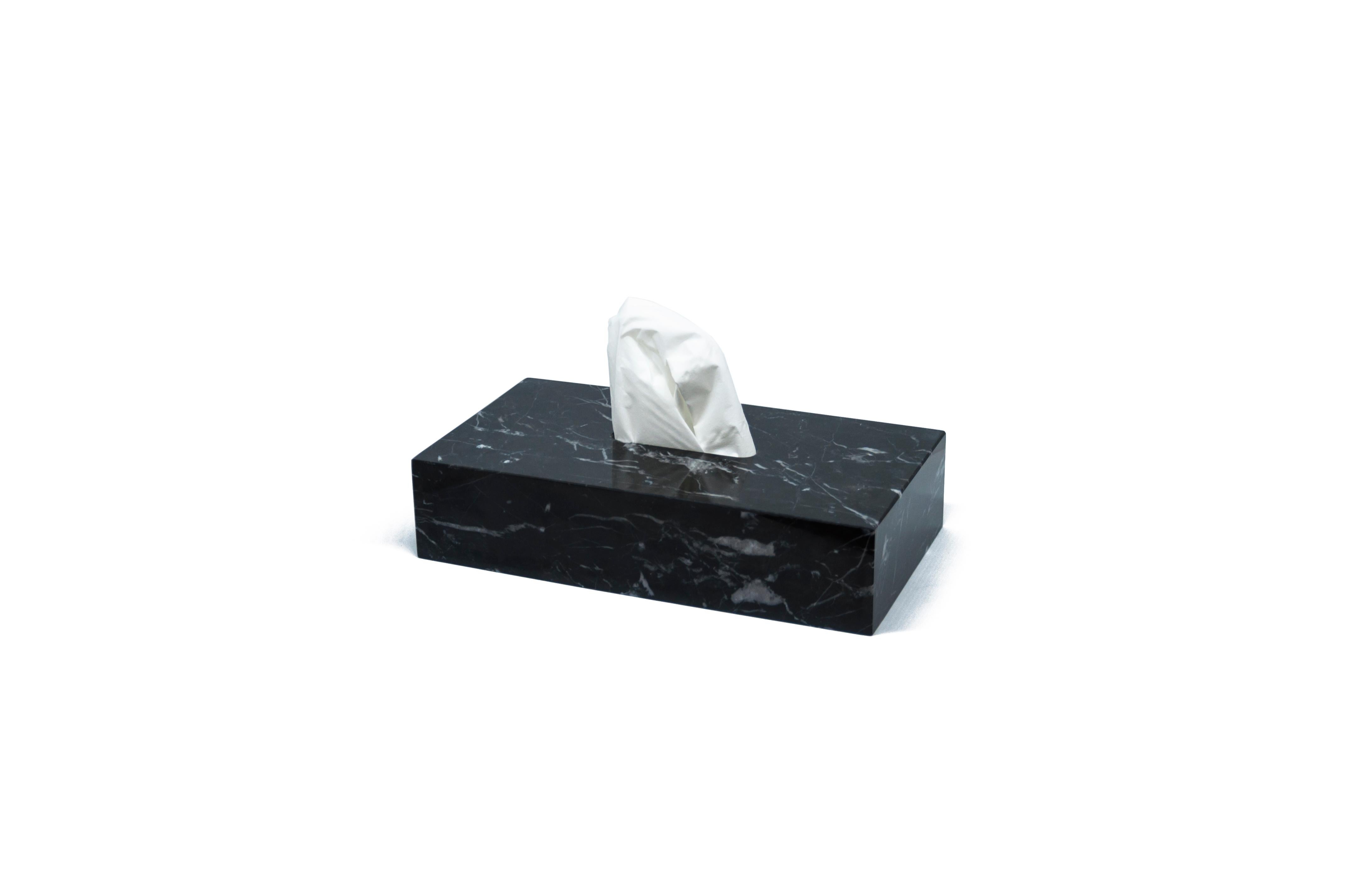 Rectangular tissues cover box in black Marquina marble.
Each piece is in a way unique (since each marble block is different in veins and shades) and handcrafted in Italy. Slight variations in shape, color and size are to be considered a guarantee of