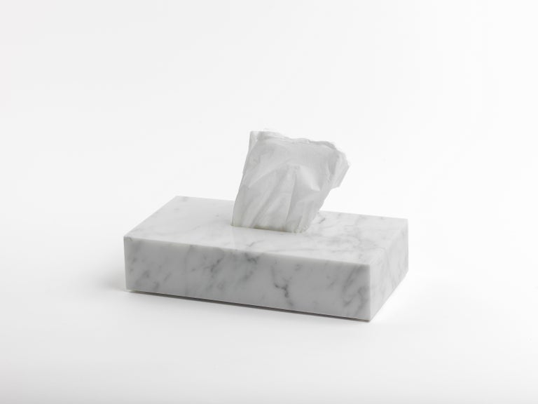 Rectangular tissues cover box in white Carrara marble.
Each piece is in a way unique (since each marble block is different in veins and shades) and handcrafted in Italy. Slight variations in shape, color and size are to be considered a guarantee of