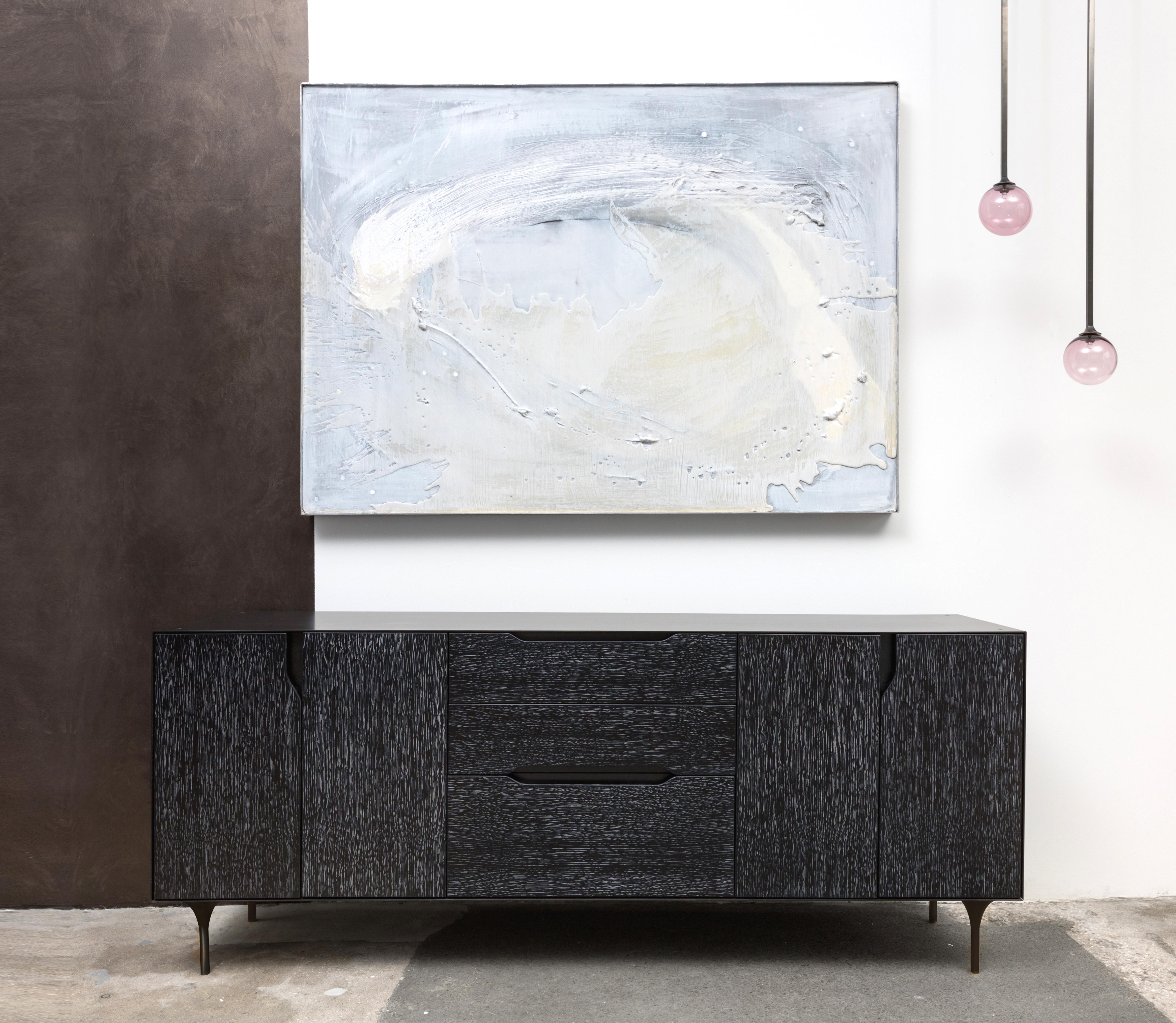 Showroom floor item. List price shown is after an applied 30% discount on this piece.

The Titan Collection stands as a reference to Industrial aesthetics with a contemporary design language. The strong blackened steel frame is complimented by the