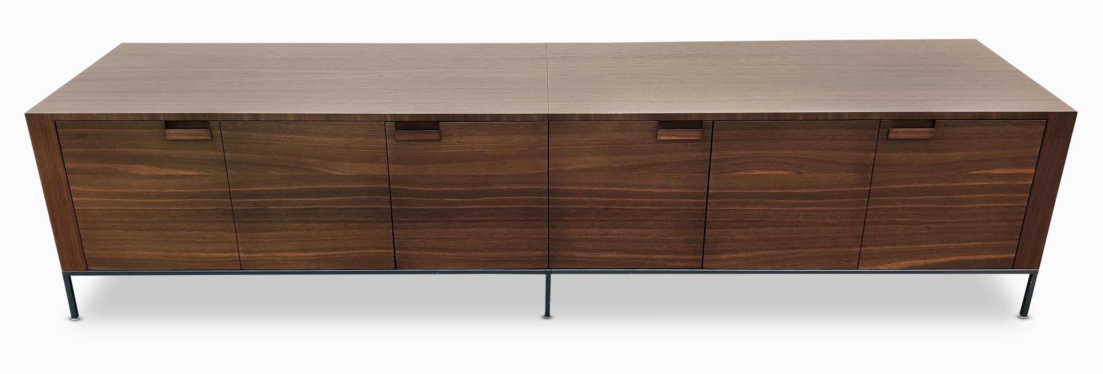 Description: A generously sized cabinet or credenza in beautiful and exotic wenge. Having 2 swing out doors, and 2 bifold doors, opening to 4 cubbies for storage. Set upon bronzed-steel frame/legs. This sleek and stylish cabinet, credenza or