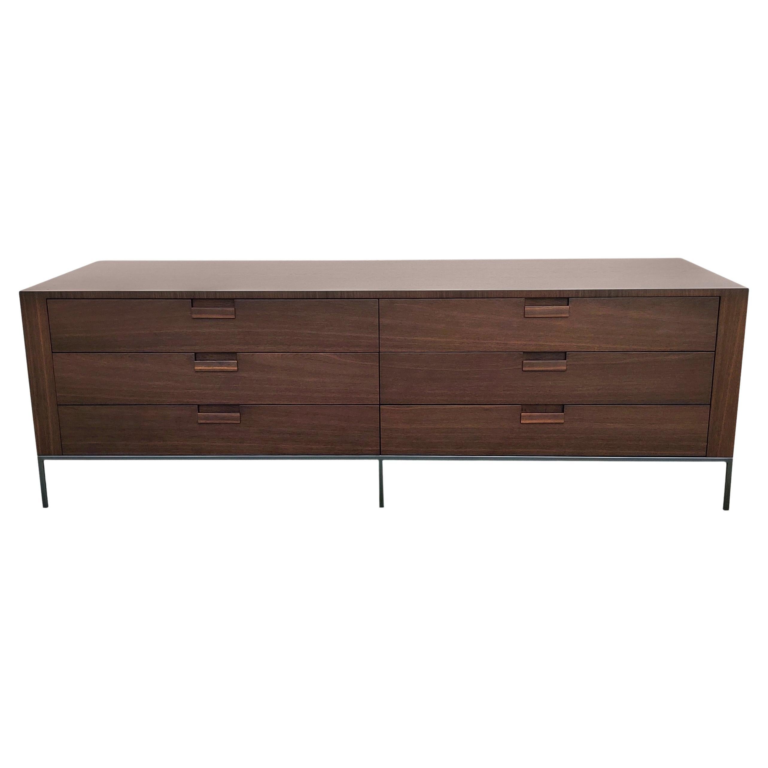 Description: A generously sized six-drawer dresser or storage cabinet in beautiful and exotic wenge. Has wenge handles. The interior of all drawers is also finished in wenge. This sleek and stylish dresser or cabinet is long, low and contemporary!