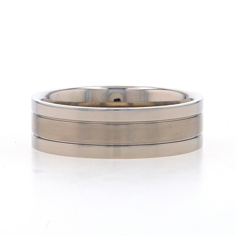 Size: 10 1/2

Metal Content: Titanium

Style: Wedding Band without Stones
Features: Smoothly Finished with Brushed Detailing Spanning the Entire Perimeter; Comfort Fit Interior

Measurements
Face Height (north to south): 5/16