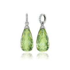 Boucles d'oreilles pendantes en titane, diamant et ambre vert