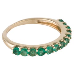 Title: 14K Yellow Gold Emerald Band Ring, Size 7, 0.65 Carat Faceted Round Emera