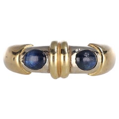 Title: 18k Yellow Gold Band Ring with Blue Sapphires