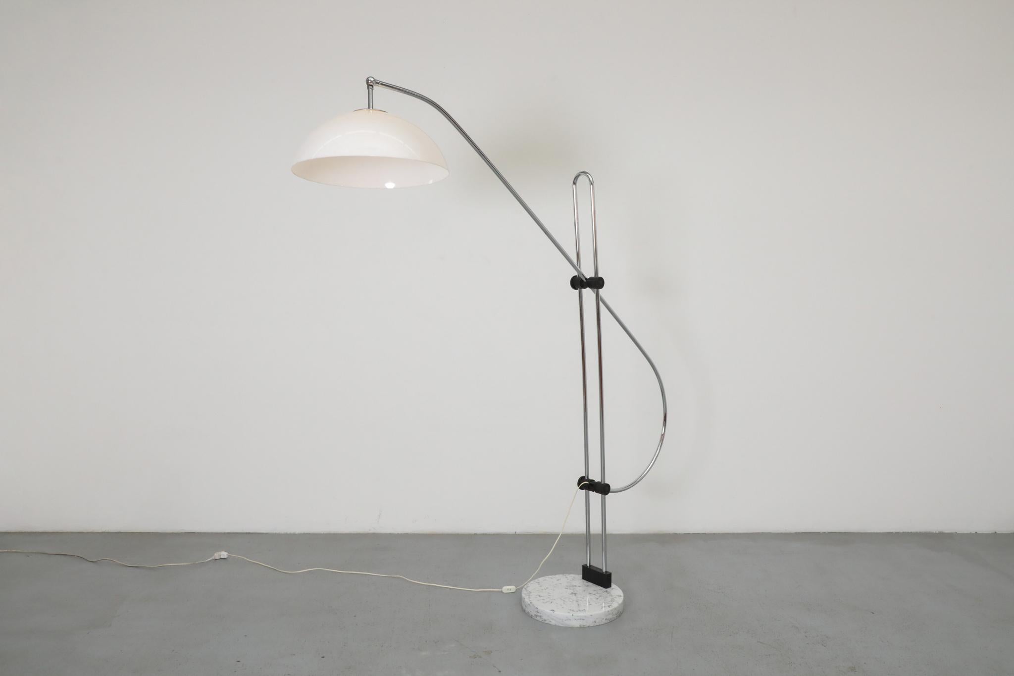 his sophisticated Italian Mid-Century arc floor lamp is an elegant example of lighting design by the renowned Gaetano Sciolari for the Belgian manufacturer S.A. Boulanger. Embodying the designer's flair for sculptural, sophisticated geometry, the