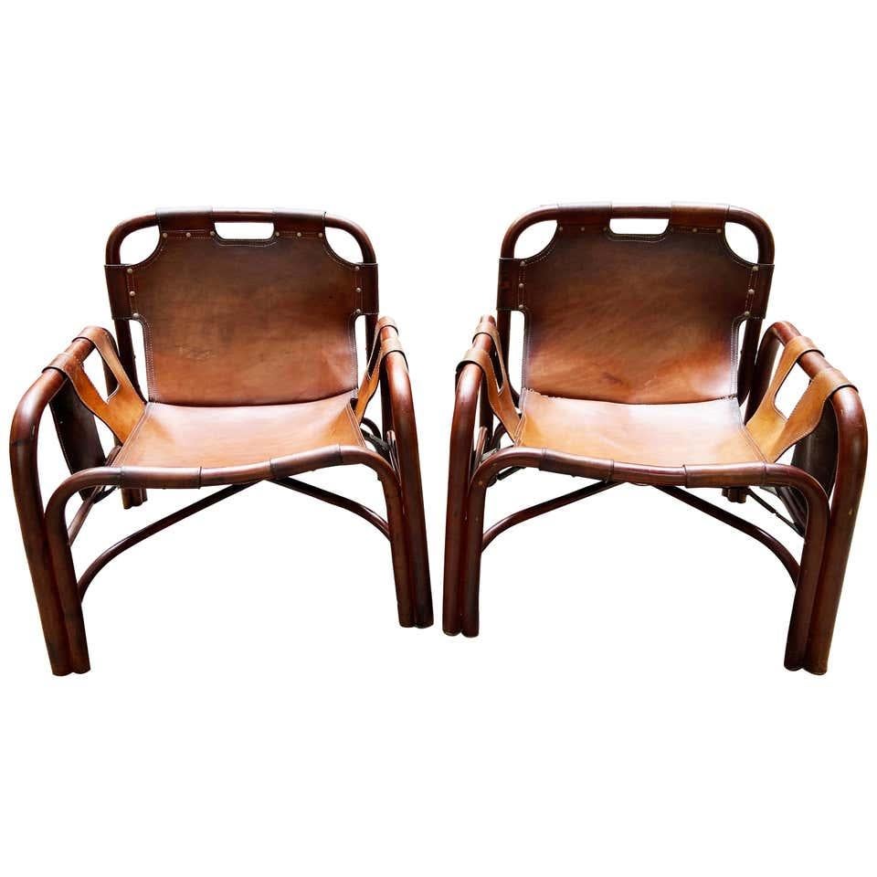Tito Agnoli 2 Safari armchairs in leather and bamboo Italy 1960s from Bonacina.
These Safari armchairs have become a Classic for the horners of those who love Italian design of Mid-Century Modern.
  