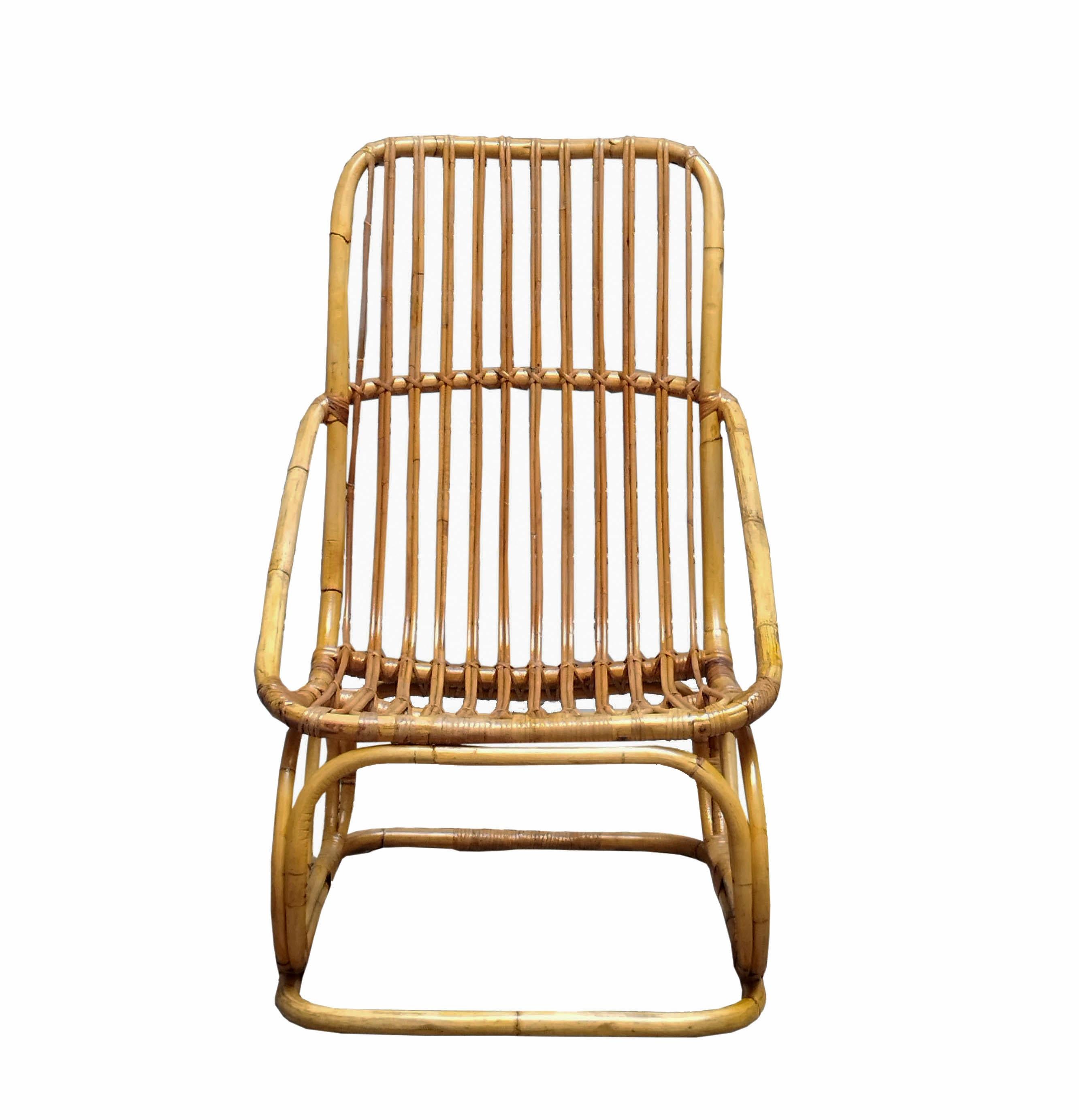 Elegant rattan armchair from the 1960s attributed to Tito Agnoli. Tito Agnoli was born in Lima to an Italian family; first an architect then a designer, he has collaborated with numerous Italian companies. Some of his pieces are in the permanent