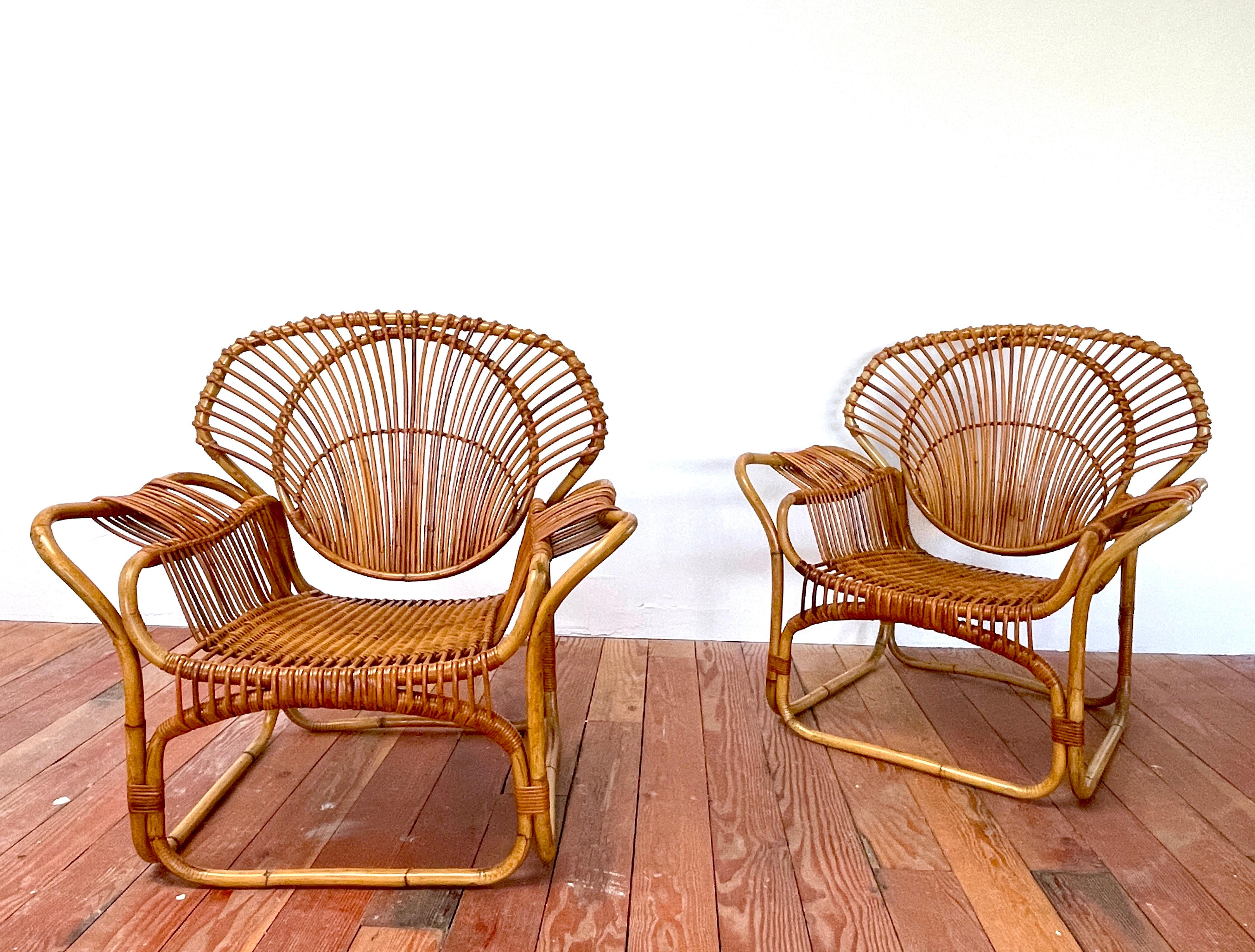 Incredible pair of sculptural wing chairs by Tito Agnoli in bamboo.