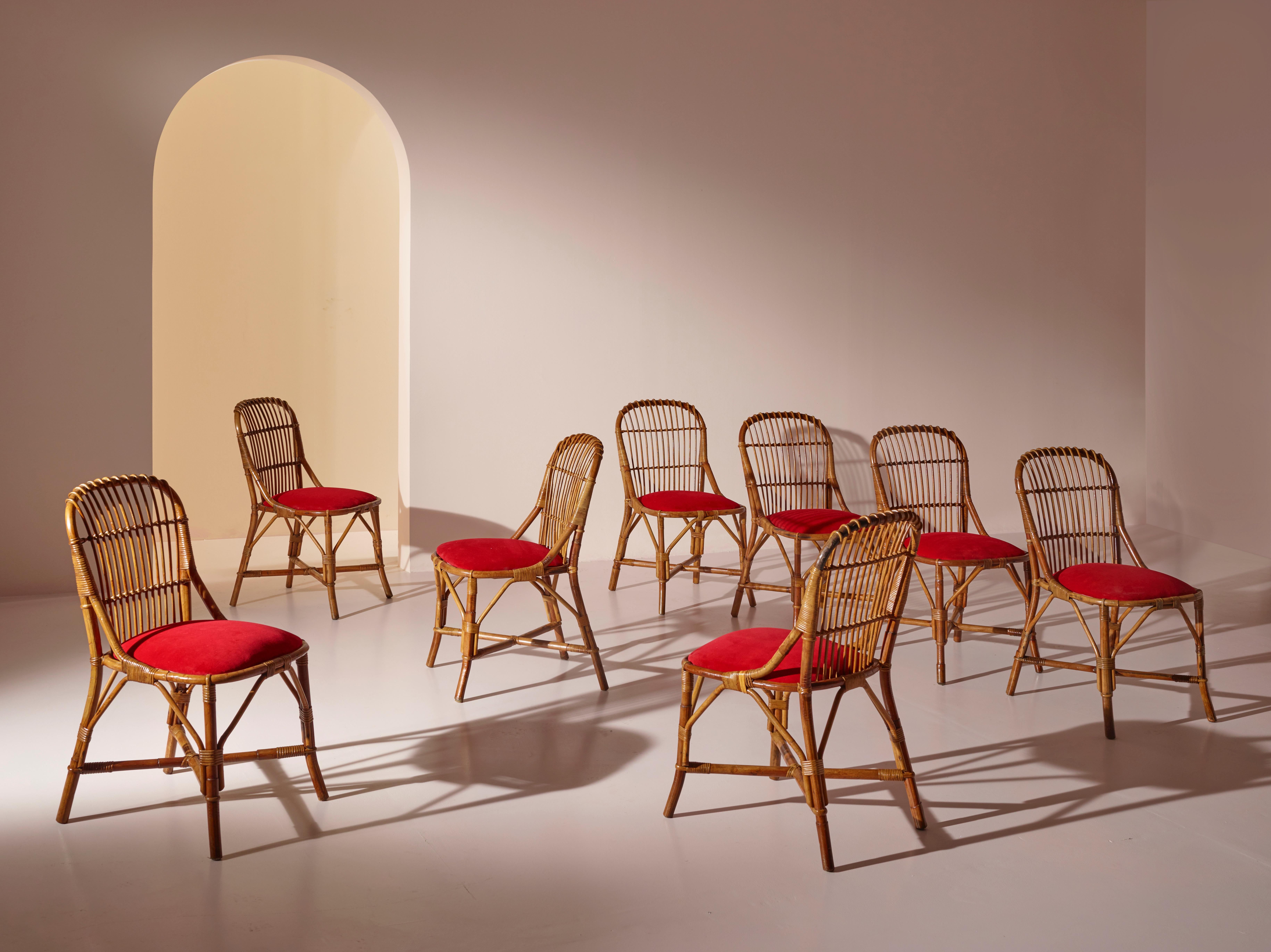 This set of eight dining chairs, designed by Tito Agnoli and produced by Vittorio Bonacina in the 1960s, is a beautiful example of Italian design of the period. The chairs are made from bamboo reinforced with cane, which lends them both strength and
