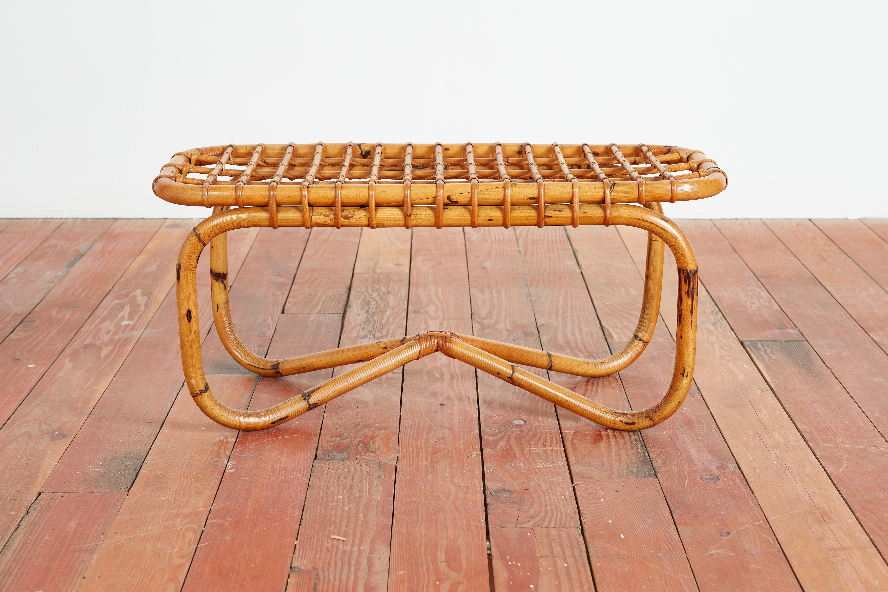 Tito Agnoli bench or coffee table in bamboo grid shape and curved loop legs.
Italy - 1950s