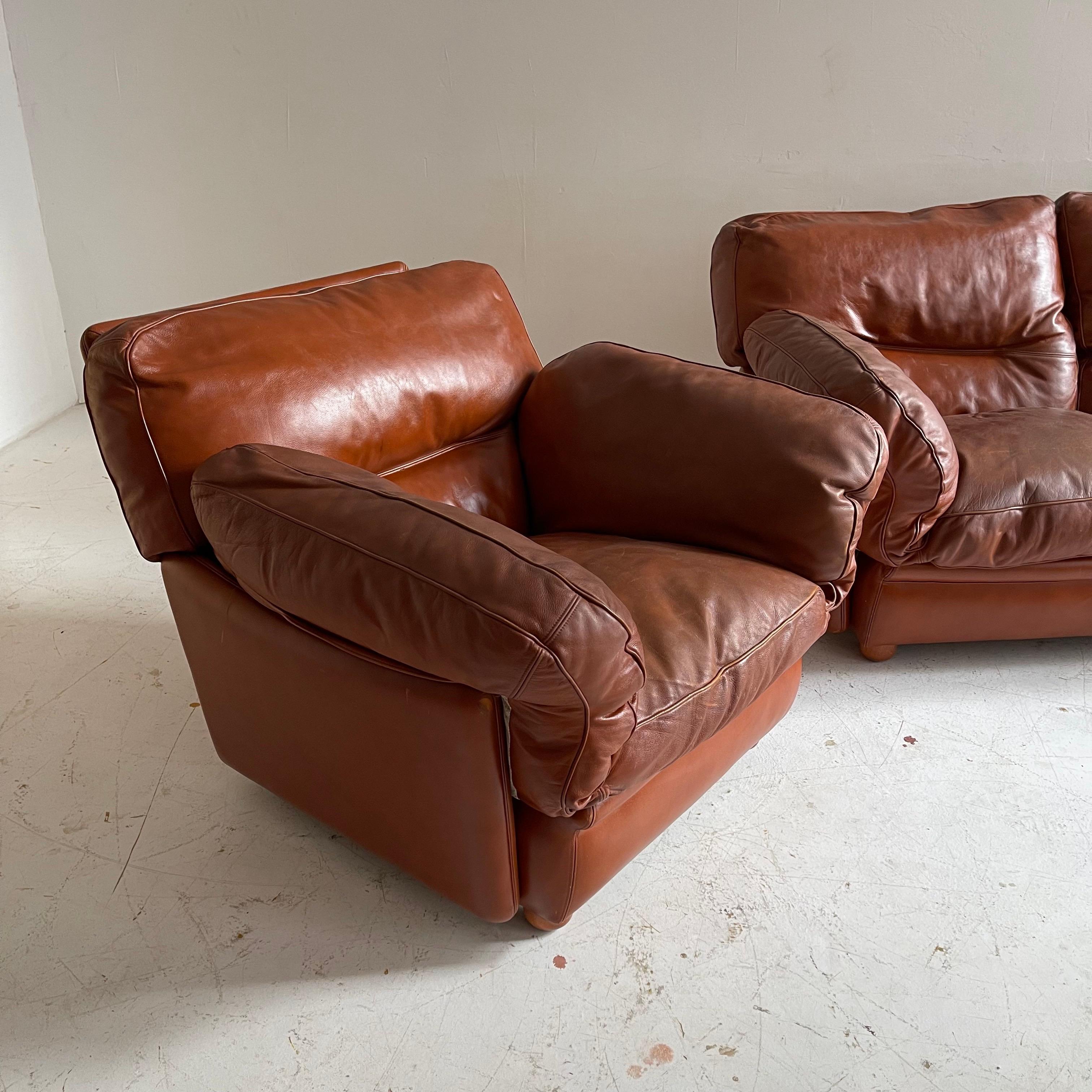 Tito Agnoli Cognac leather sofa suite Model 'Poppy' Paltrona Frau, Italy 1970s. Patinated burnt orange leather

Armchair: 90cm x 100cm x 80cm - Seat height 50cm.