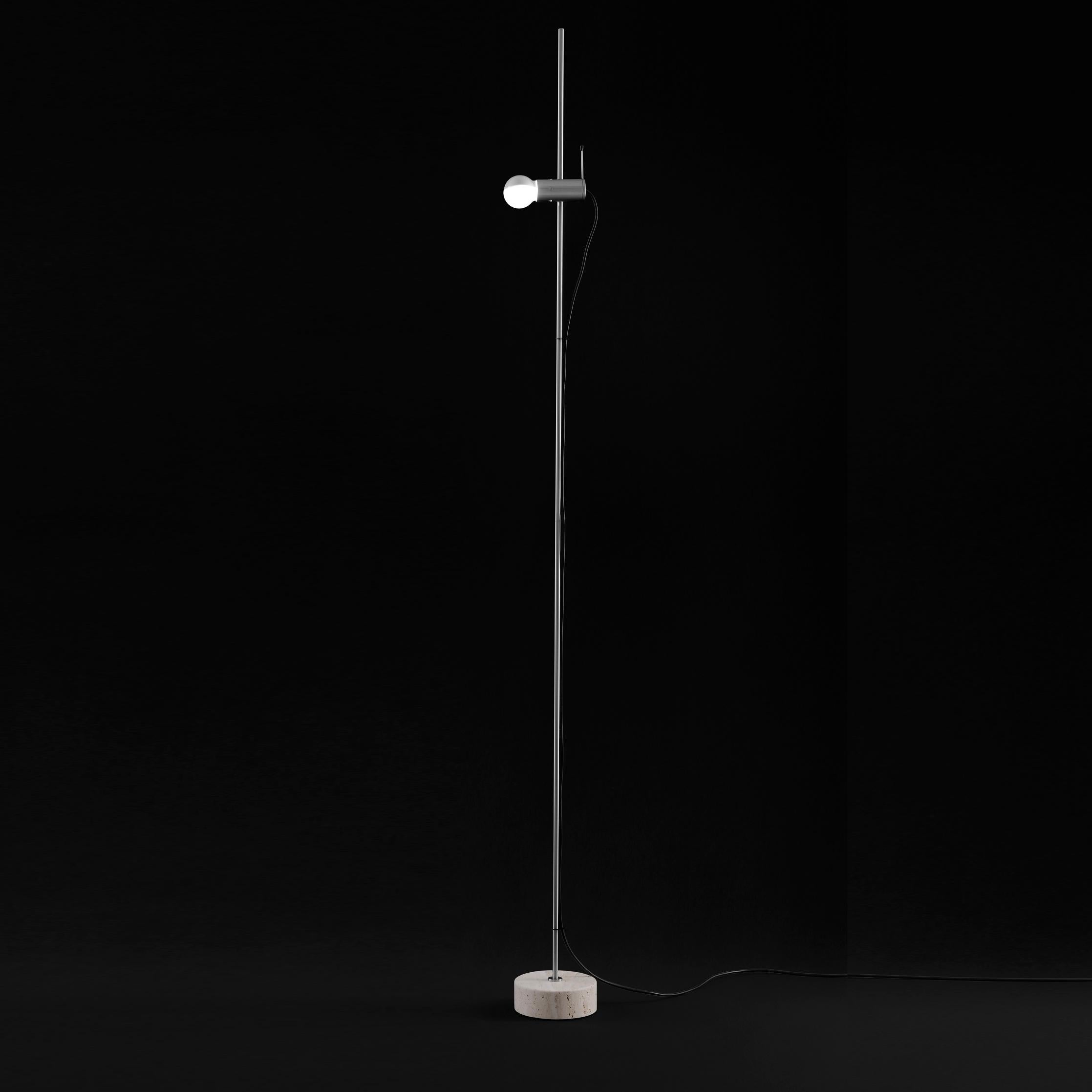 Floor lamp 'Agnoli' designed by Tito Agnoli in 1954.
Floor lamp giving direct light, Travertino marble base, stem and height adjustable reflector mat nickel-plated. Manufactured by Oluce, Italy.

As a precursor of minimalism, the Agnoli lamp used