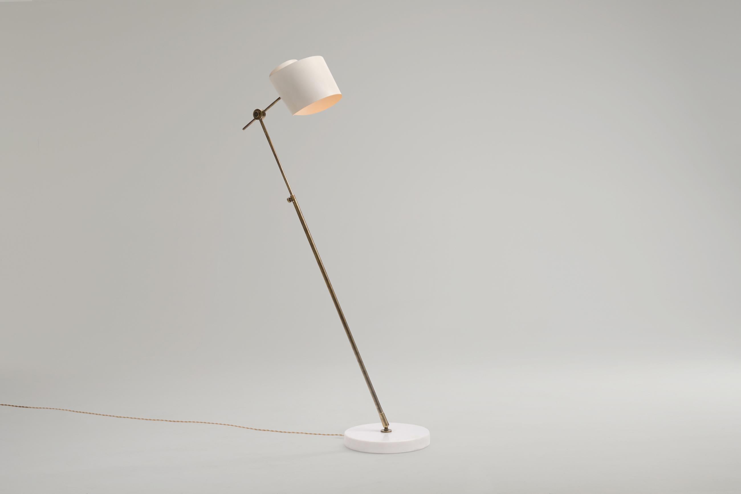 Stunning and rarely seen floor lamp by Tito Agnoli for Oluce, Italy, 1950's. Rare model with unusual shade 'spinnaker' shaped shade made out of aluminium, a brass stem and a clear white marble base. Very intelligent design with inventive technical