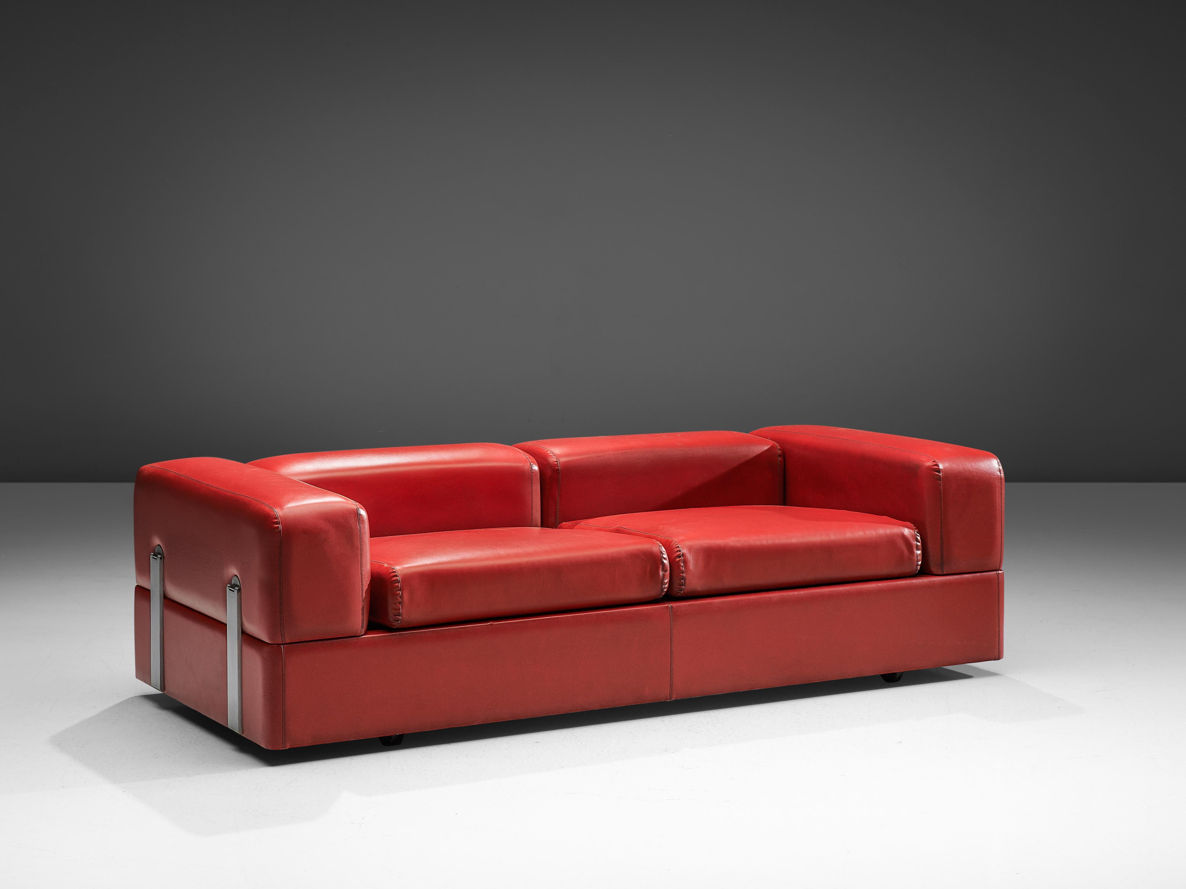 Tito Agnoli for Cinova, sofa or daybed model 711, red leatherette, steel, laminated wood, Italy, 1960s

Cubic sofa that can be transformed into a daybed by Italian designer Tito Agnoli for Cinova. The chromed steel frame displays an exquisite