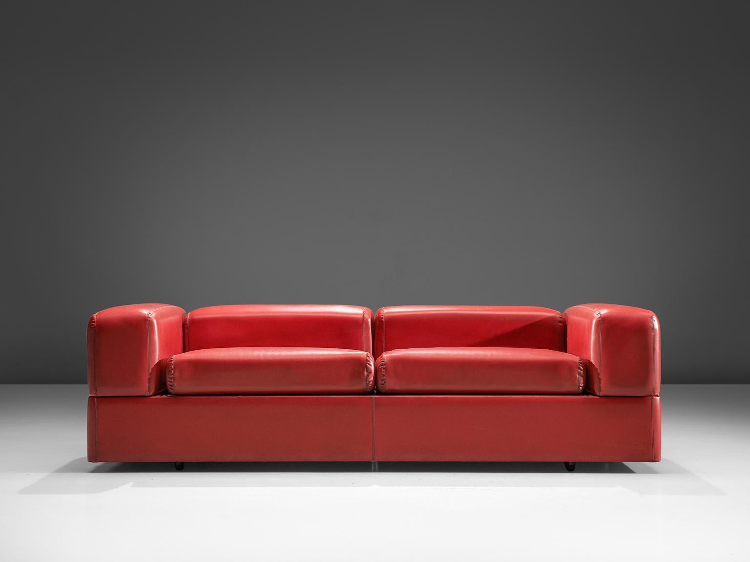 red leatherette sofa