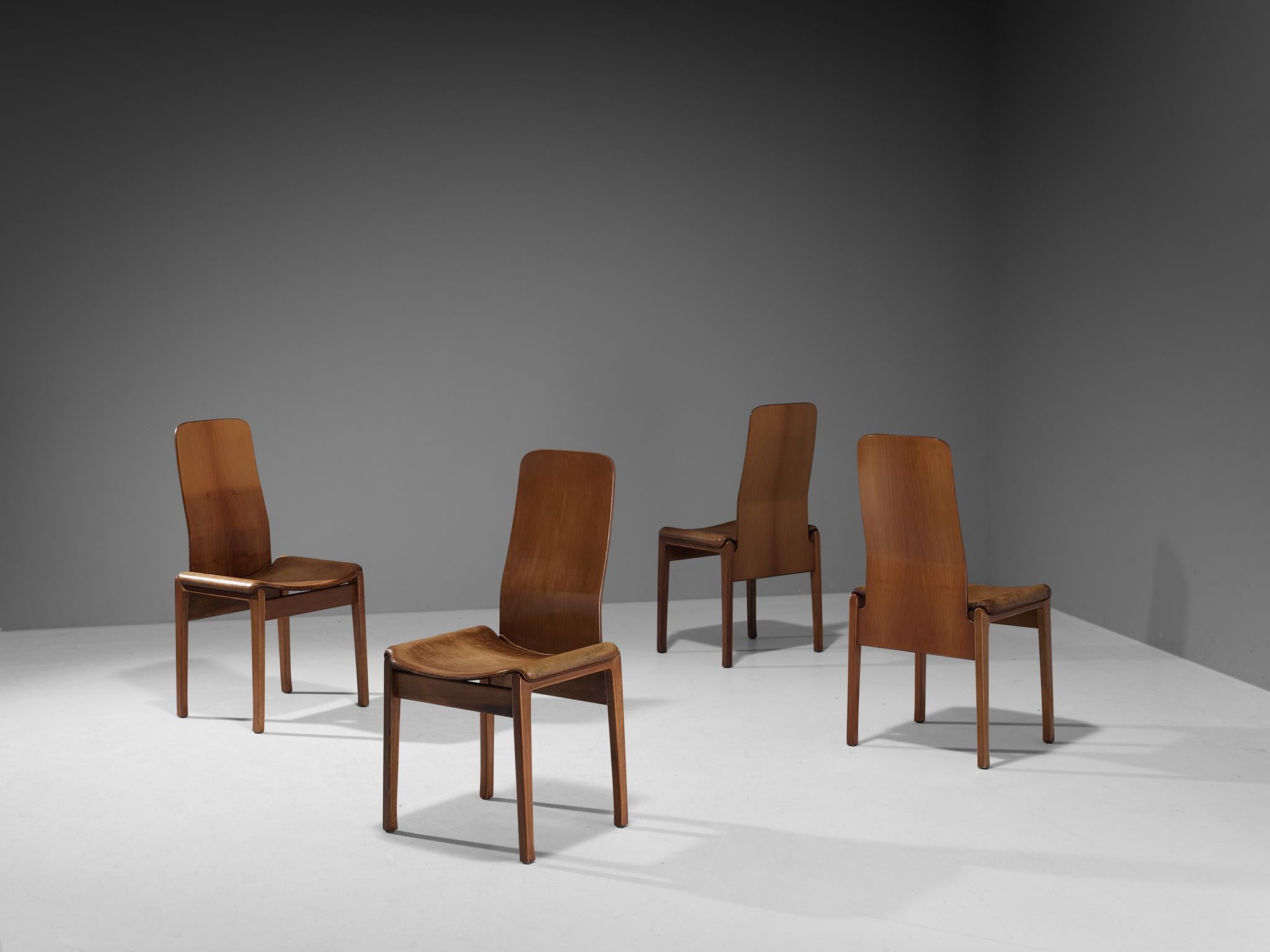 Tito Agnoli for Molteni, set of four 'Fiorenza' dining chairs, walnut, leather, Italy, 1968

These chairs are an excellent example of Italian Mid-Century design. The back is slightly curved in the middle, which is not only aesthetically pleasing,