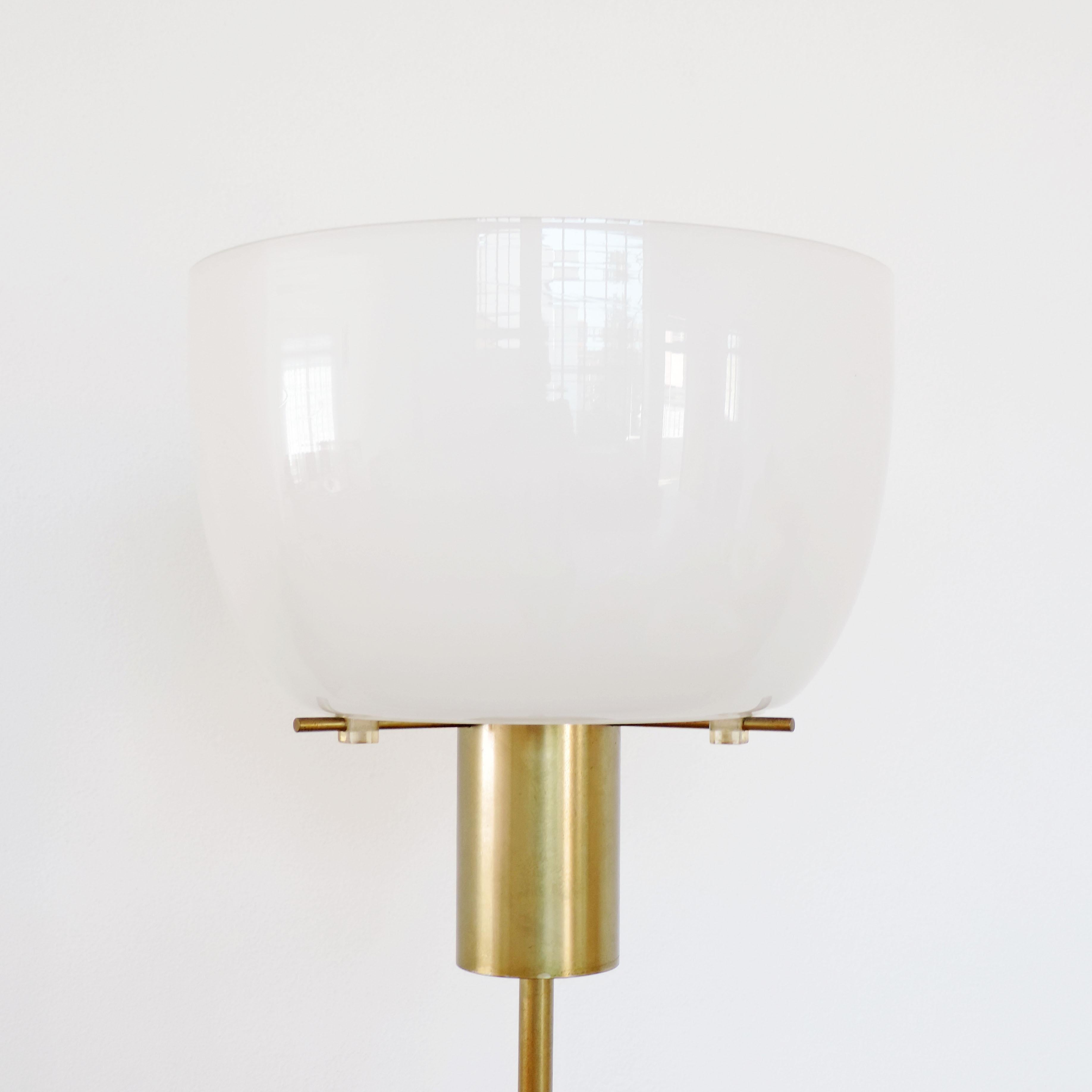 A rare Giuseppe Ostuni for O'luce floor lamp, Italy 1960s.
When the lamp is lit the orange plexiglass gives warmth to the light.