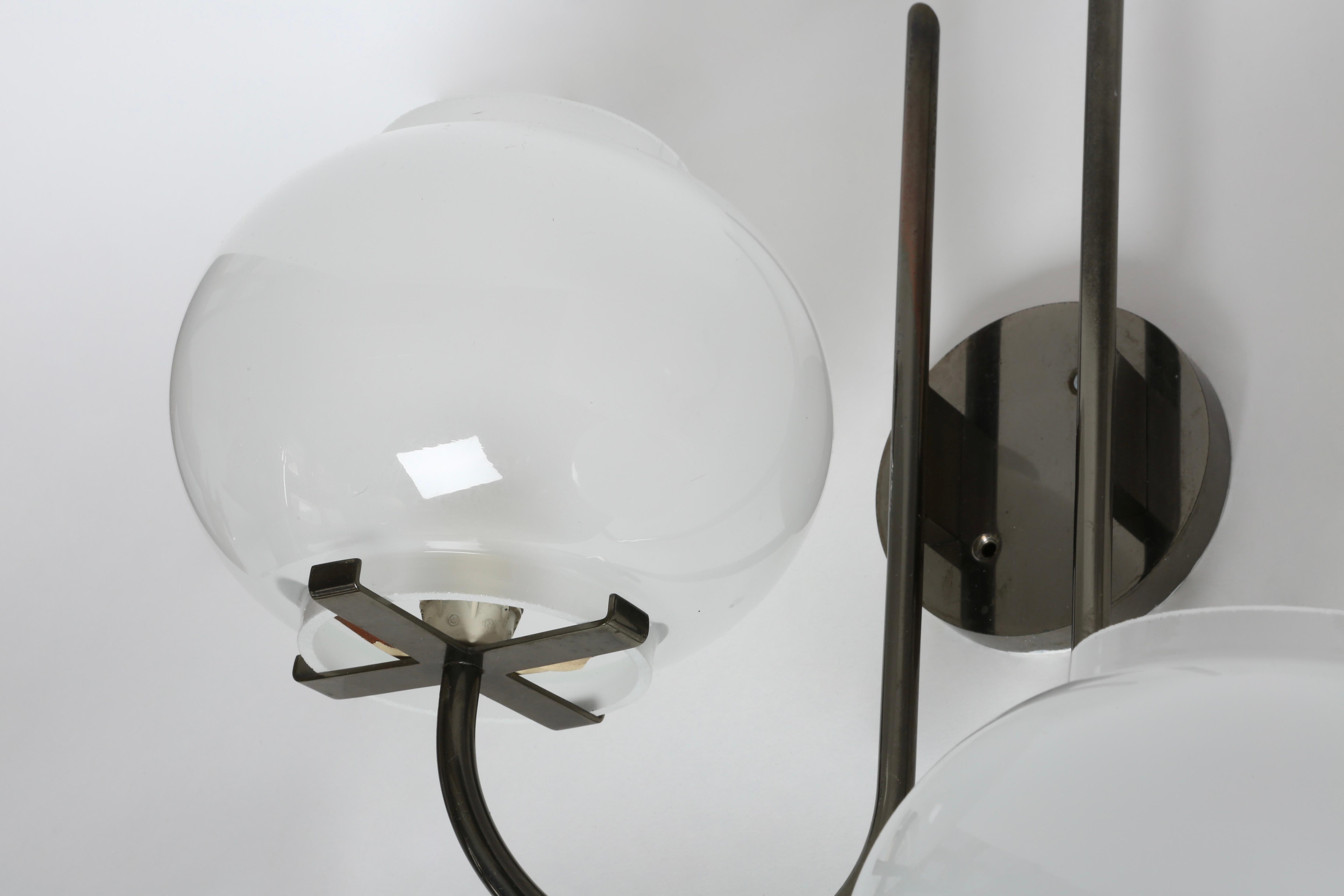Ottone Tito Agnoli for Oluce sconces, a pair Italy circa 1960s in vendita