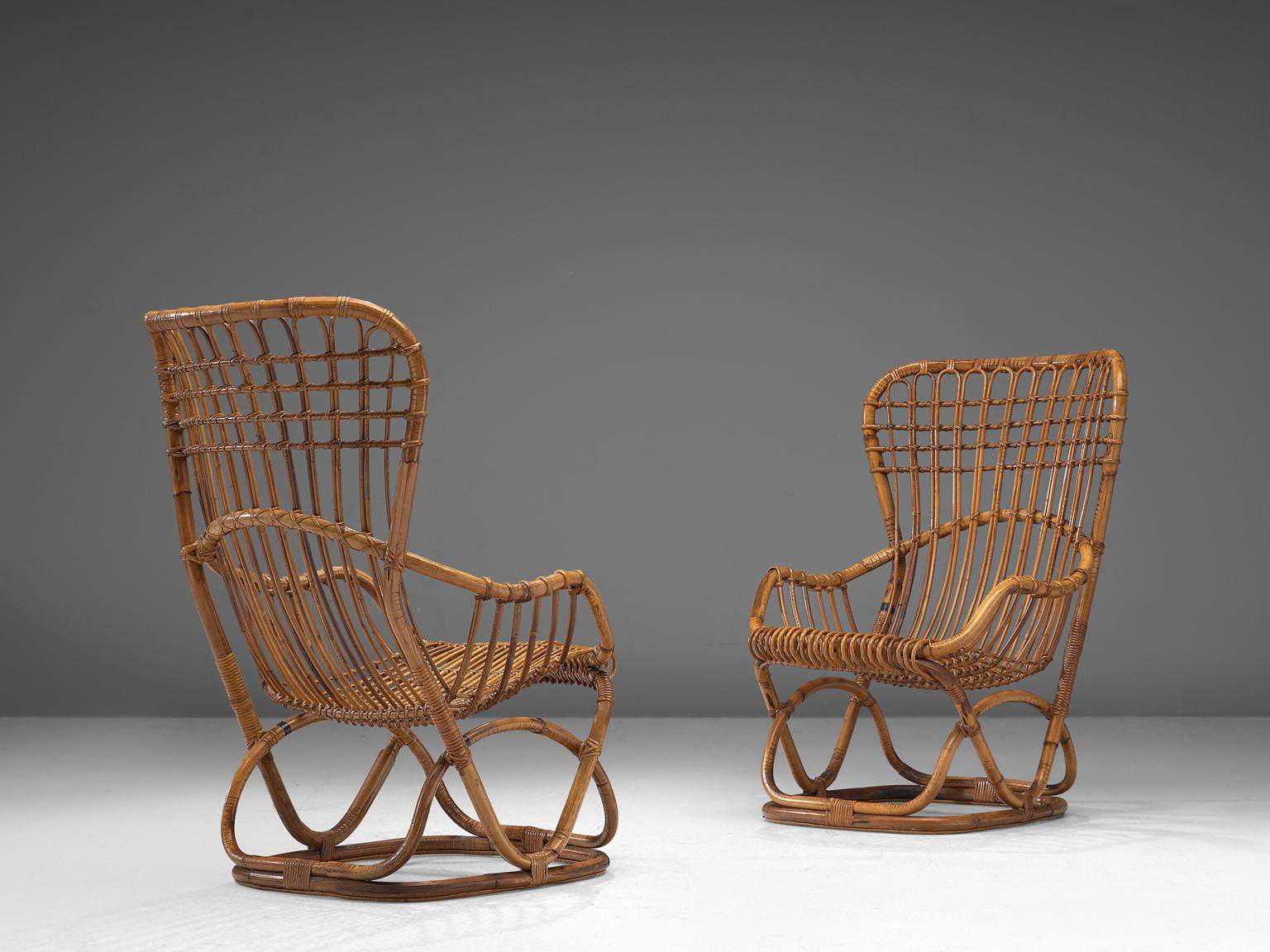 Pair of lounge chairs, ratting, Italy, 1960s.


This rattan lounge chair has strong features of Tito Agnoli's Rattan Lounge chair. These pieces are completely made of rattan, crafted together with an eye for detail and well decorated. It has a