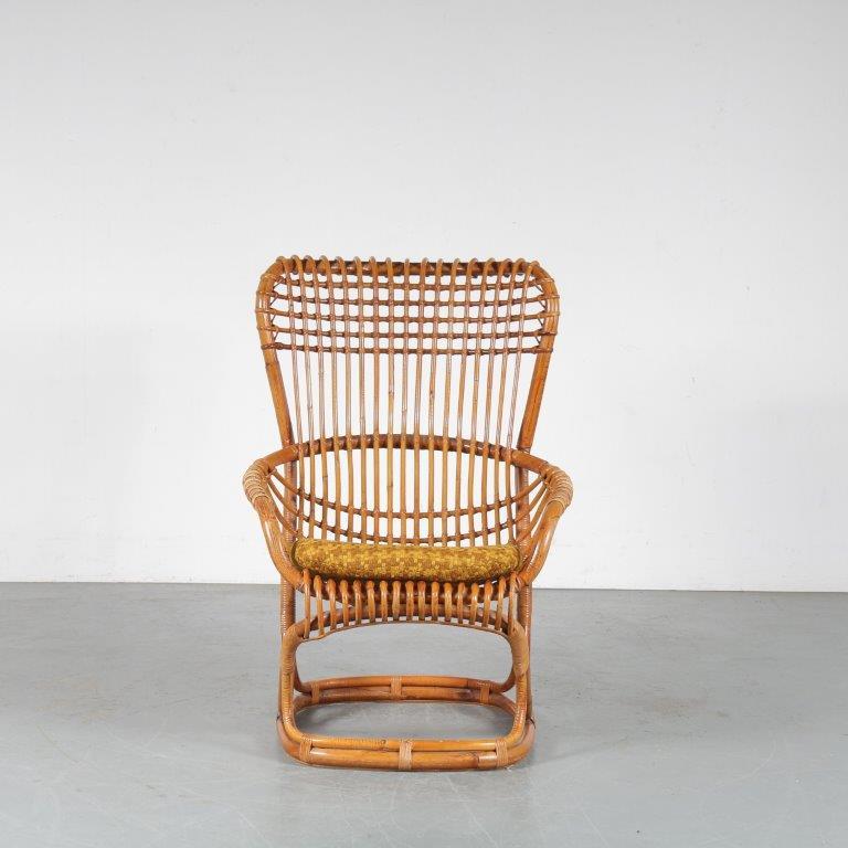 A stunning rattan lounge chair designed by Tito Agnoli, manufactured in Italy in the 1960s.

This eye-catching piece is completely made of the highest quality rattan, beautifuly crafted together with an amazing eye for detail. It has a high back