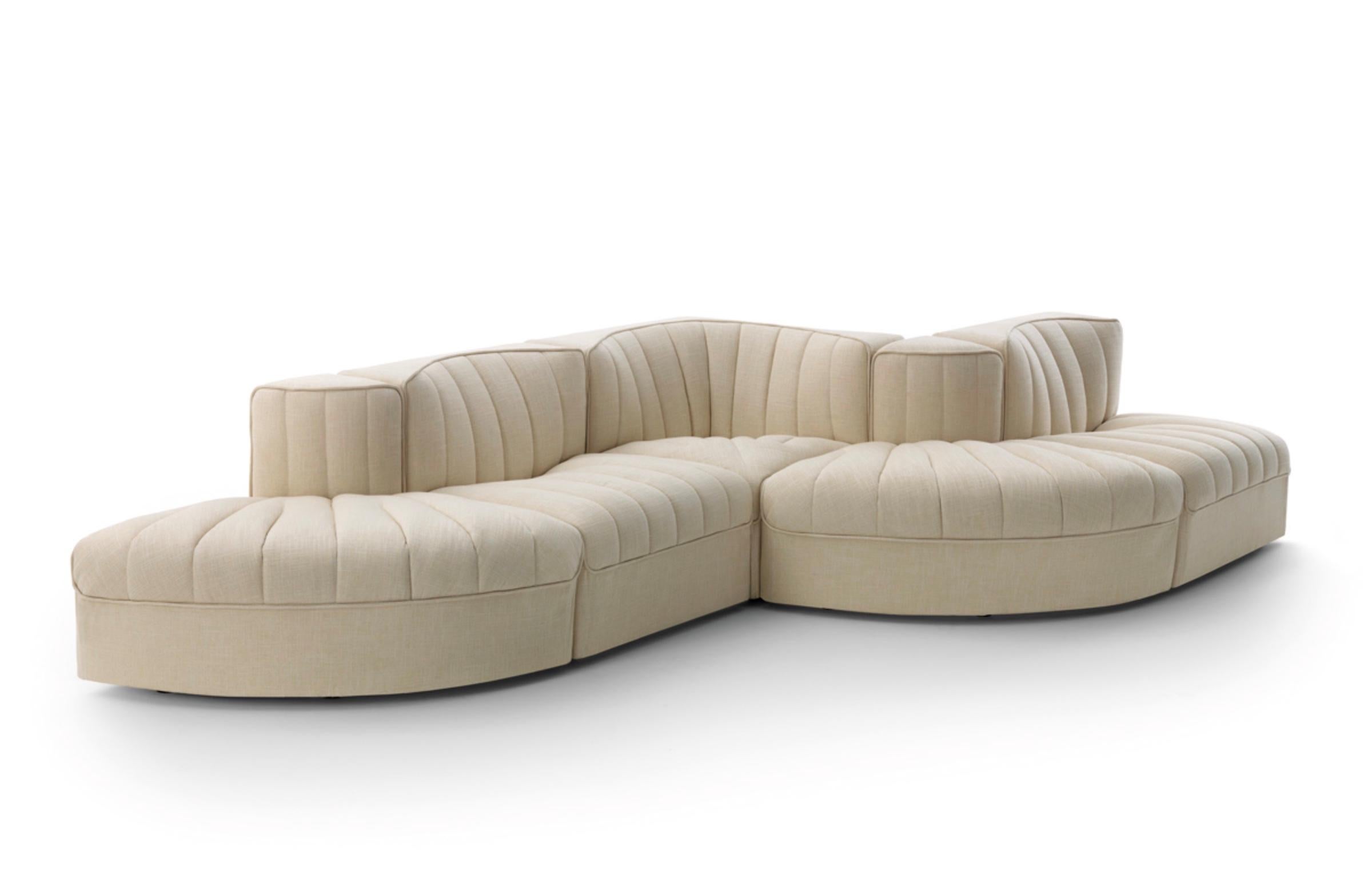 Tito Agnoli '9000' Sofa 1969 for Arflex, Italy. New, current production.

Modular seating system, this listing is for a 5 piece serpentine version.

The modular seating system '9000' by Tito Agnoli is a compact, rounded seating system that allows