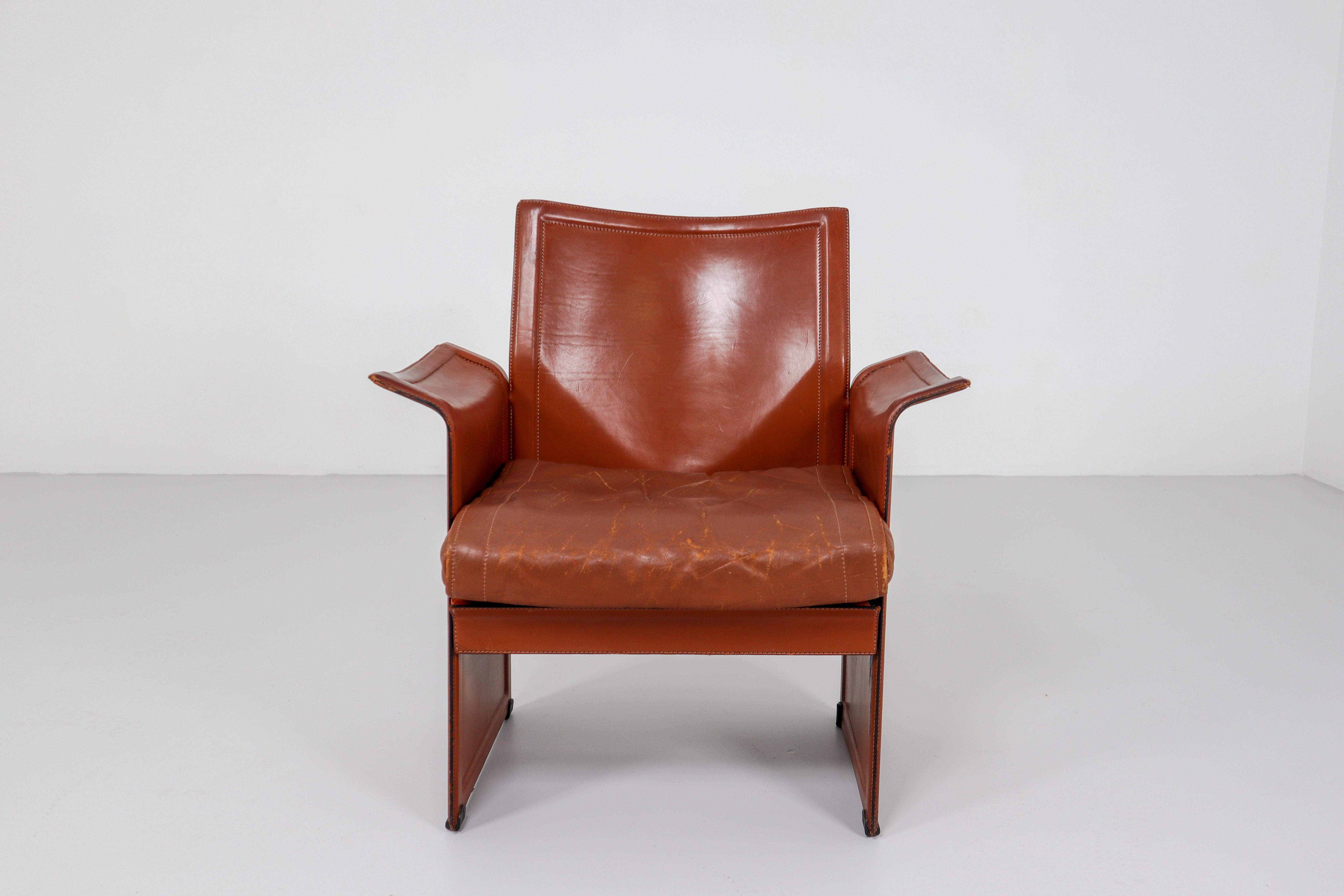 Tito Agnoli for Matteo Grassi, set of five Korium chairs, patinated cognac leather and metal, Italy, 1970s

These sophisticated iconic Korium patinated cognac leather chairs were designed by Tito Agnoli for Matteo Grassi. It features a strong