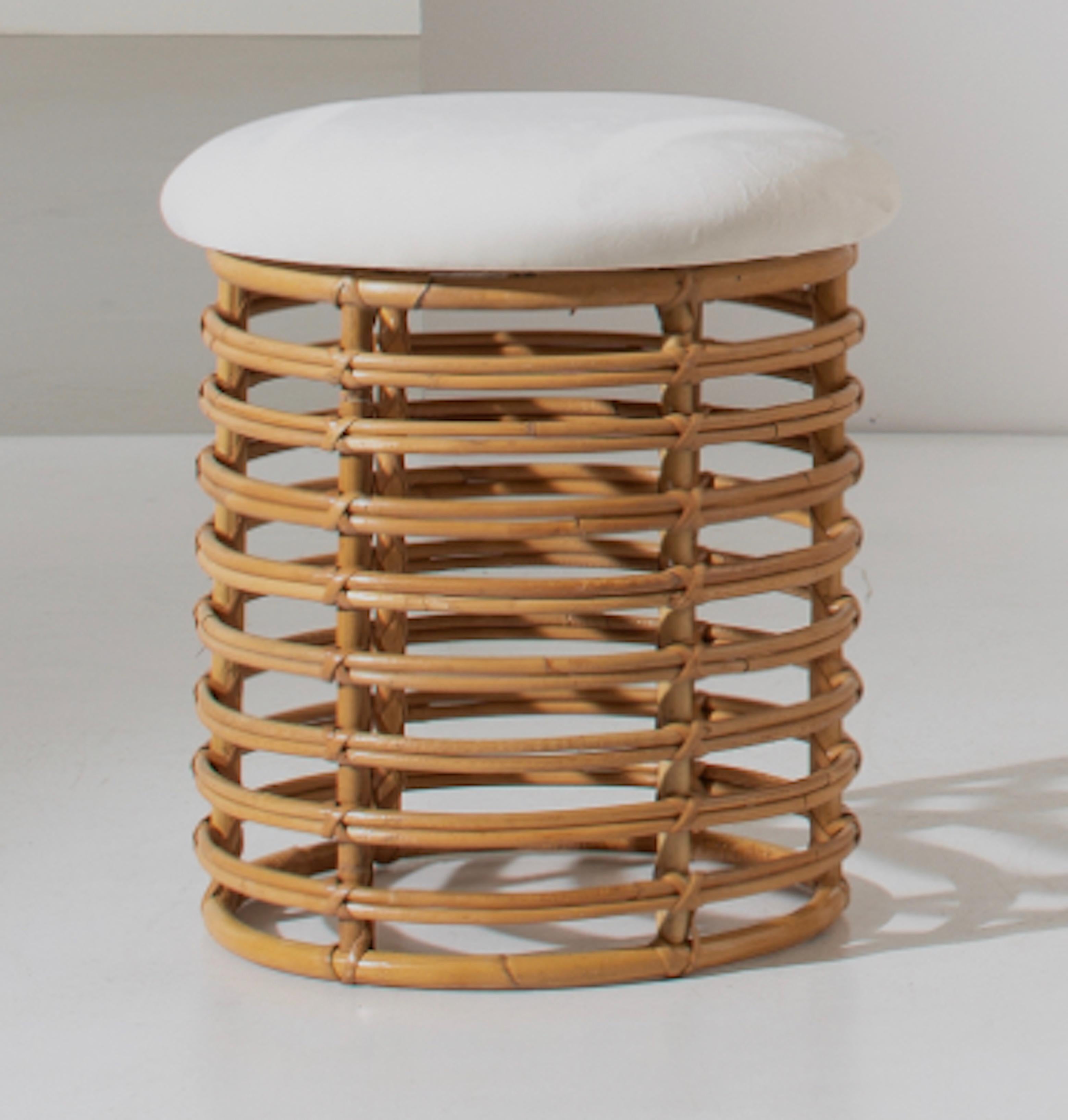 Pair of beautiful bamboo stools, created by the Italian architect and designer Tito Agnoli in 1960.

A synthesis of elegance and Italian style, refinement and lightness, these stools will give great personality and good taste to your home landscape