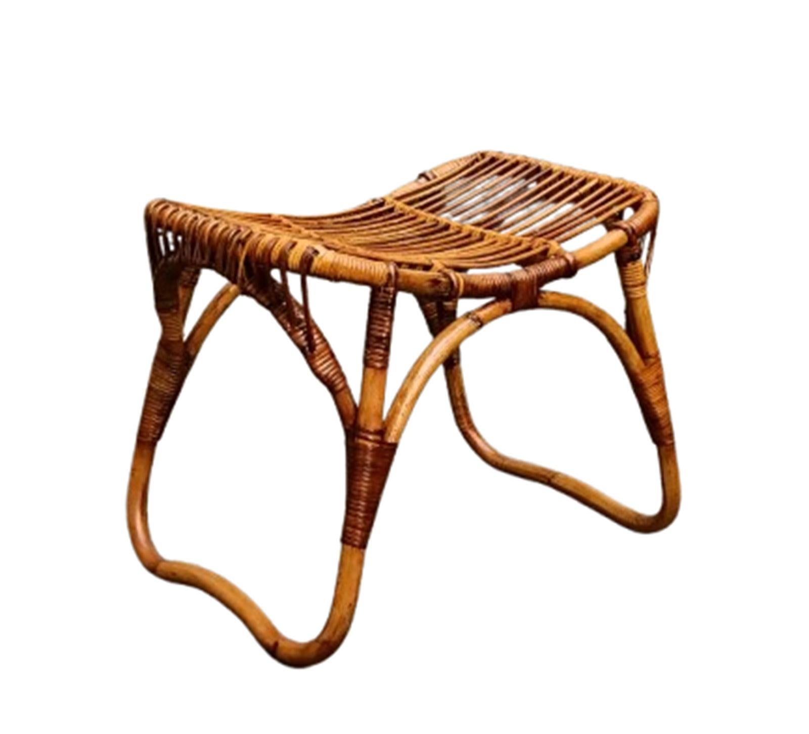Fantastic pouf  completely made of curved rattan and hand woven wicker with perfect proportions . This incredible rare French Riviera style pouf was designed by the mastery of Tito Agnoli and produced by Bonacina in Italy during the 1960s.
In good
