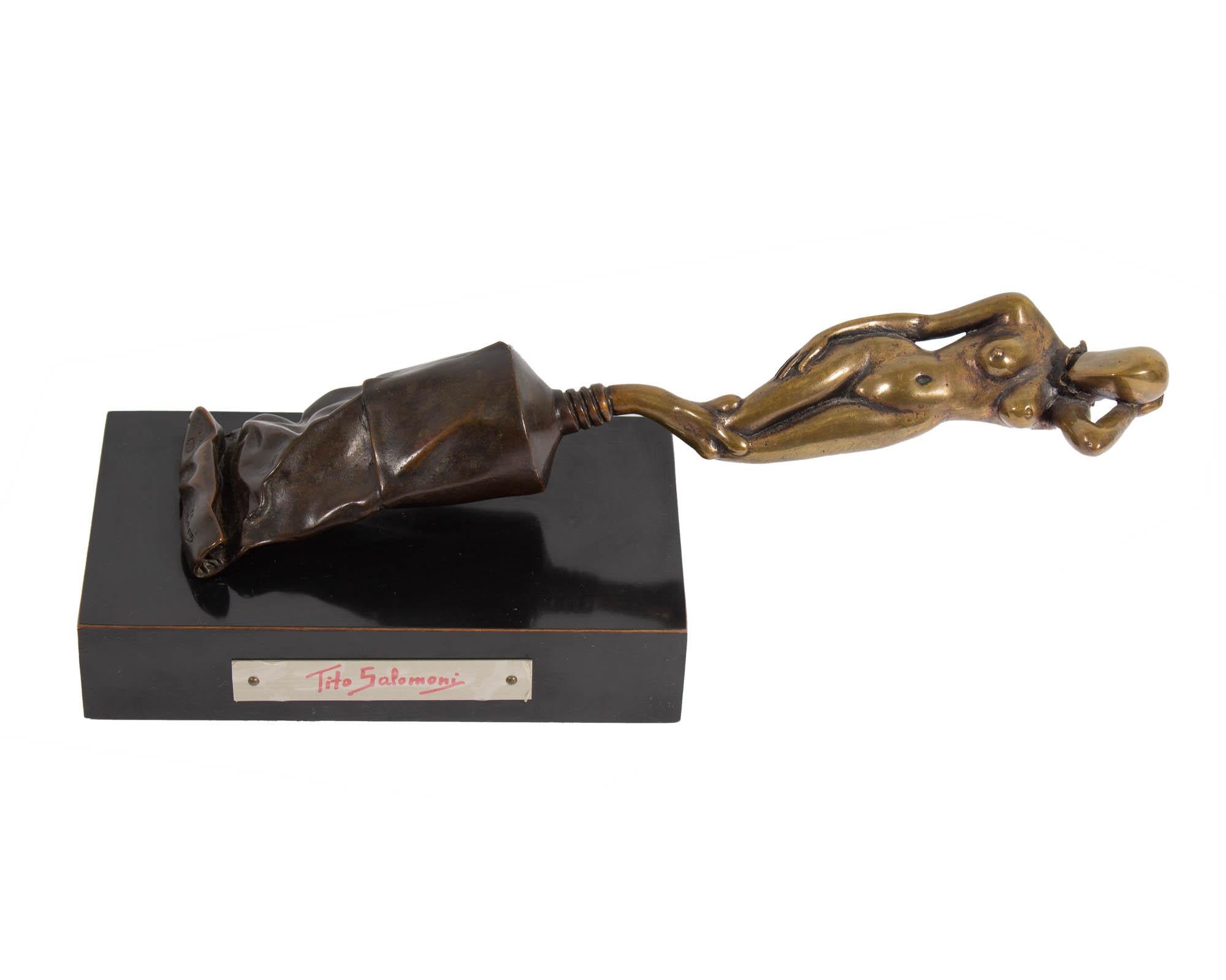 A limited edition bronze Surrealist sculpture by the Italian artist Tito Salomoni (1929-1989). This fanciful sculpture depicts a nude female figure emerging from a paint tube. Signed and numbered 1/50 to the end of the tube, the sculpture is mounted