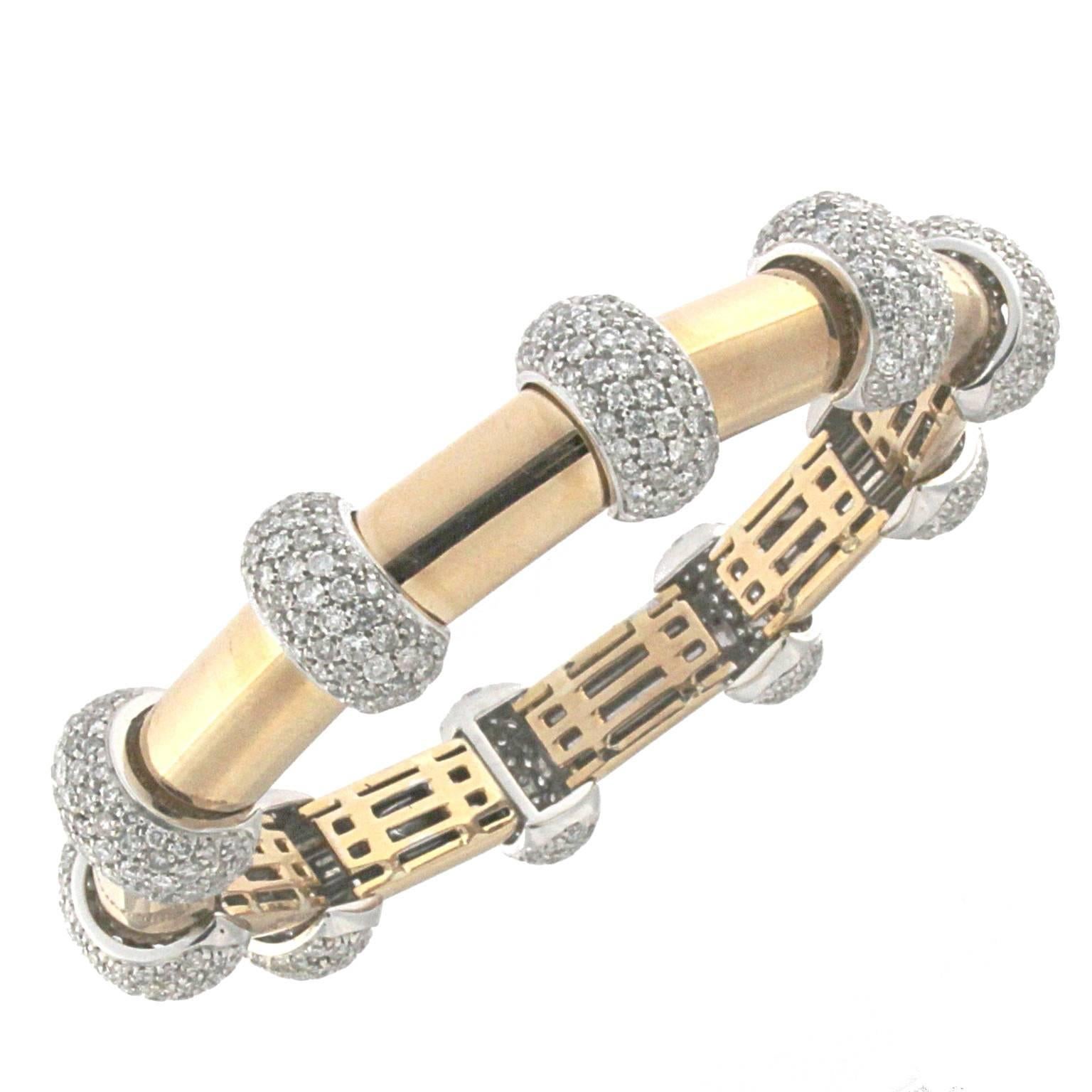 Titti collection bracelet in 18 kt rose gold and white diamonds 

The total lengh is 18.00 cm
the total weight of the gold is 56.10
the total weight of the diamonds is ct 10.21 (color HG clarity VVS1)
STAMP: 10 MI ITALY 750

