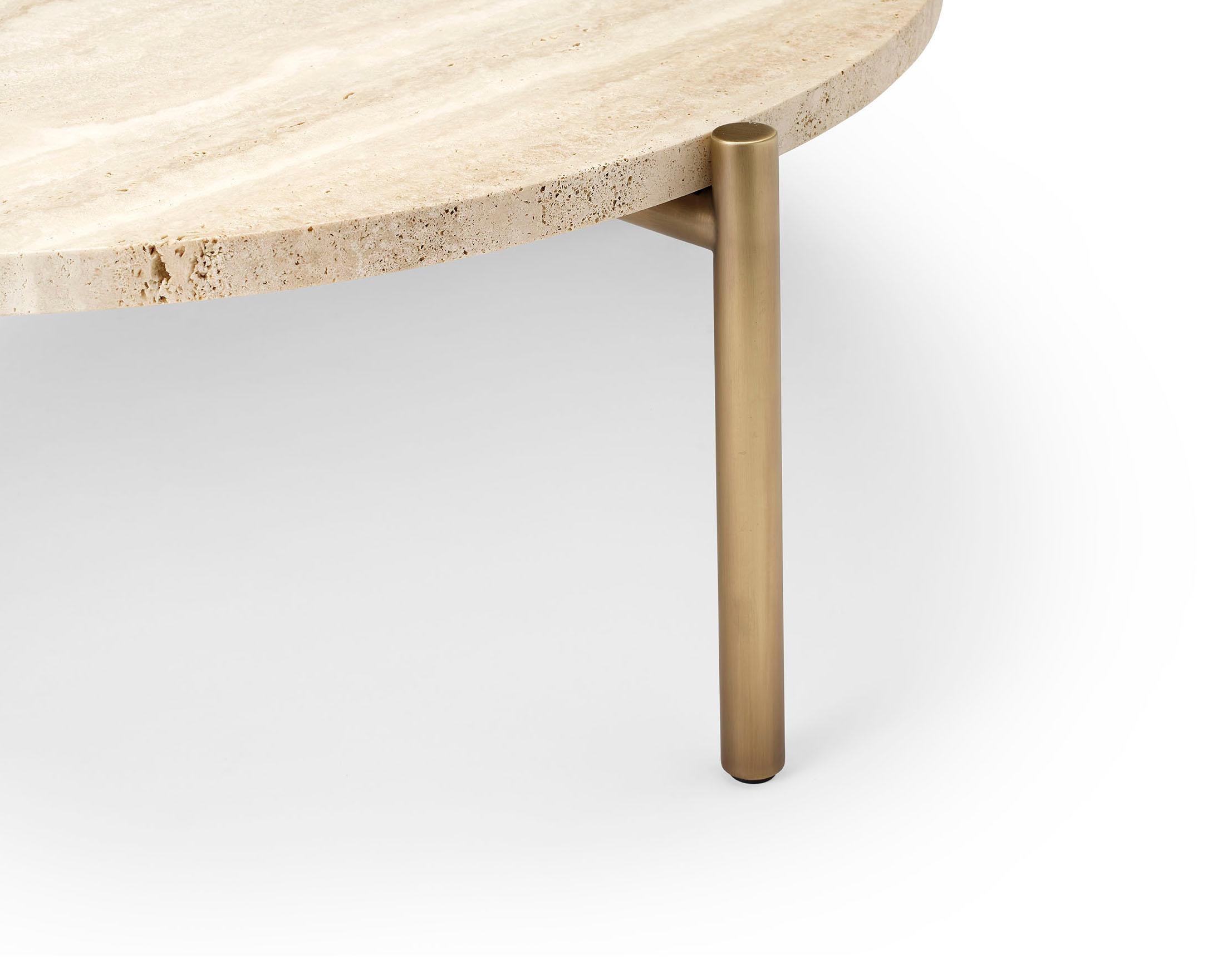 Ten10 Tivoli coffee table with 3 legs and a round travertine top. The table measures 39