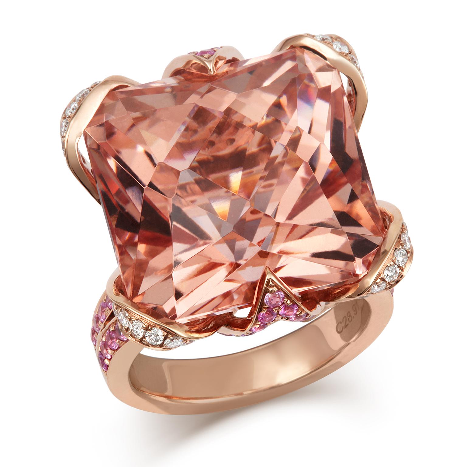 'THE CROWN' - For Queen & Country - Inspired by the Glory of Great Britain! This stunning grand ring has been crafted in 18ct Rose Gold and is set with sparkling fine diamonds, pastel-pink Sapphires and crowned with a Spectacular 28.91ct peach-pink