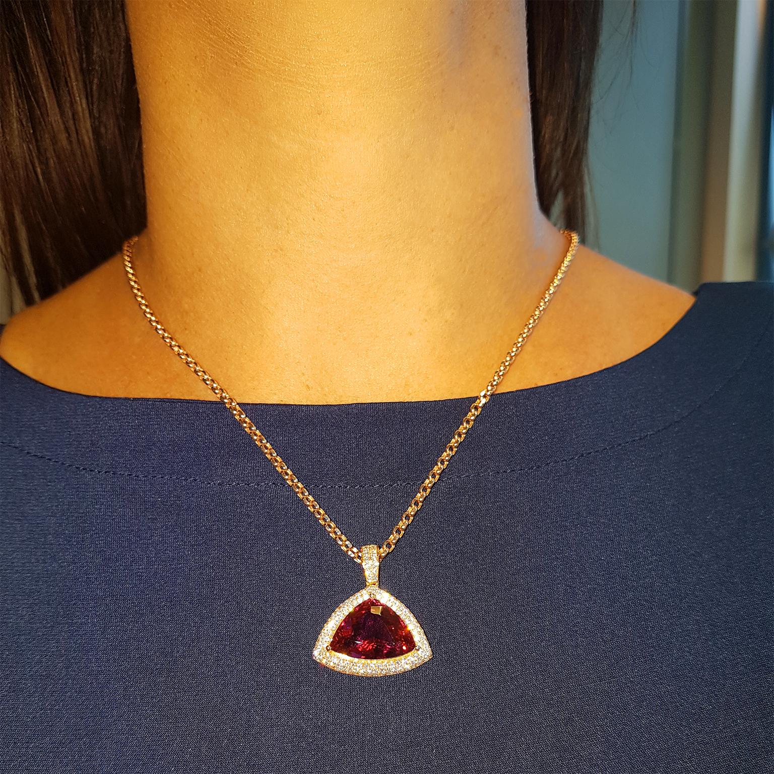 PERFECT PINK! This magnificent cocktail pendant has been crafted in 18ct Rose Gold and set with 1.43ct of glittering fine white diamonds & a perfect 12.59ct vivid-pink Tourmaline. One-off & Exclusive!  18ct 18 inch chain included.